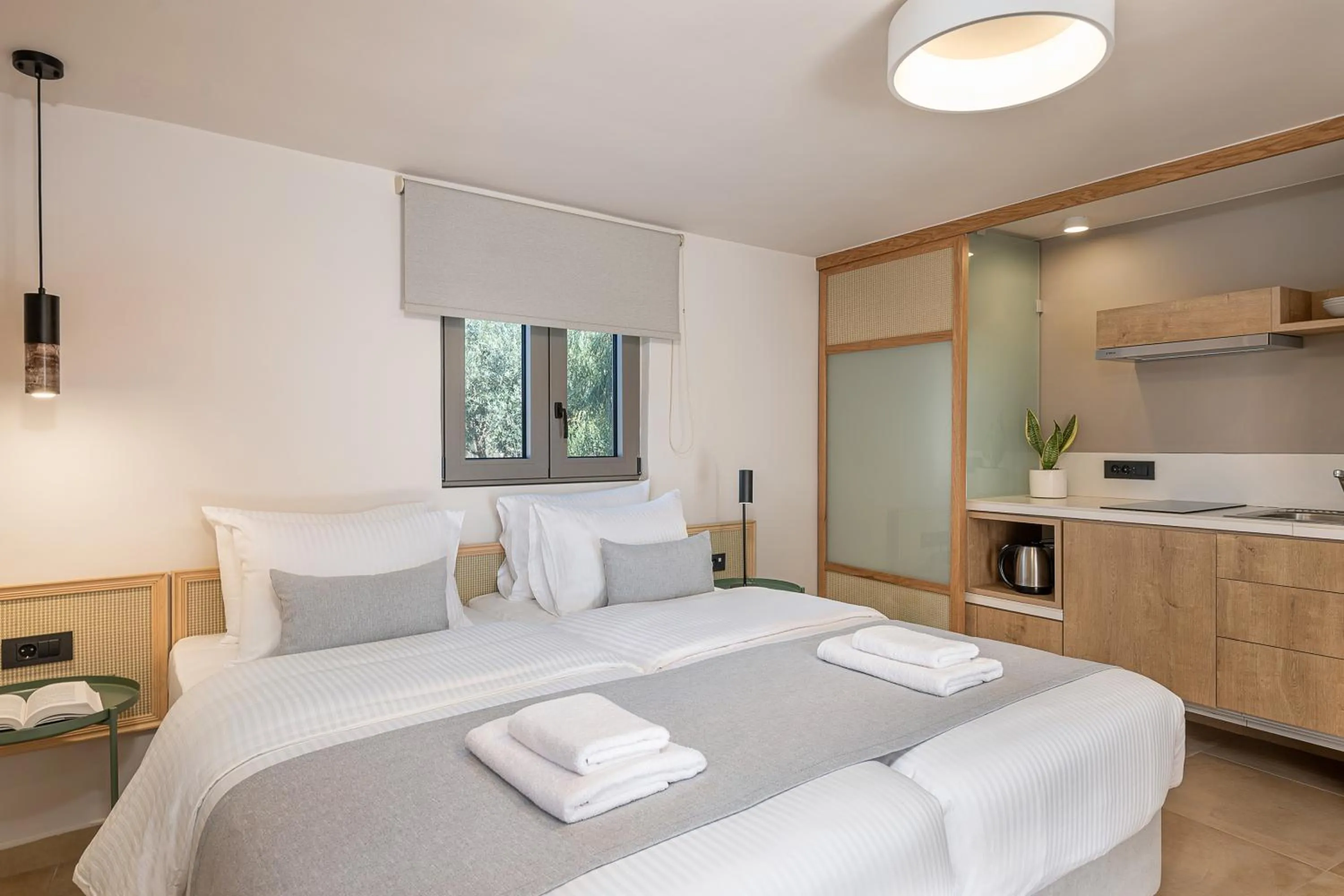 Photo of the whole room, Bed in Elafonisi Resort by Kalomirakis Family