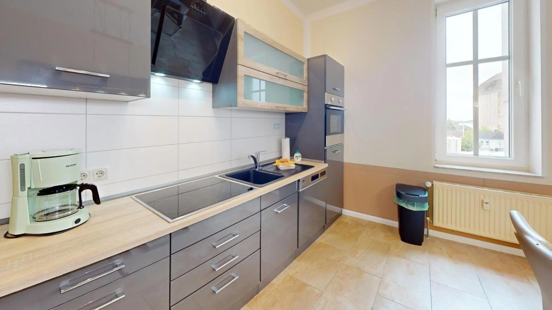 Kitchen or kitchenette in Apartments am Sund