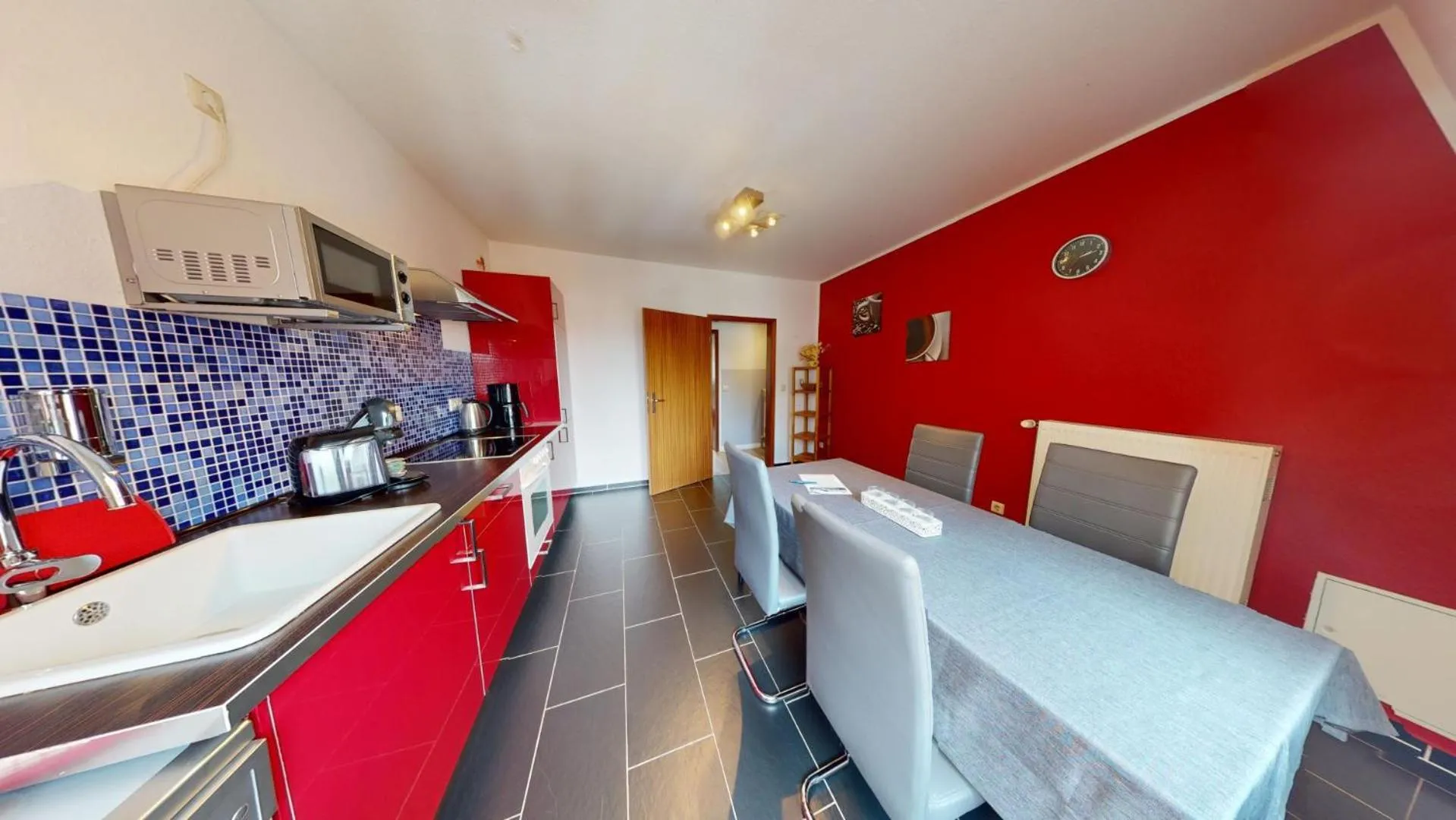 Kitchen or kitchenette in Apartments am Sund