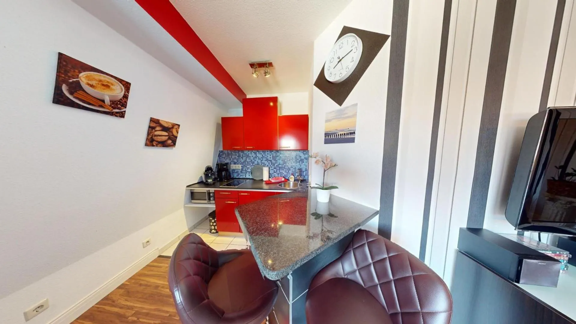 Kitchen or kitchenette in Apartments am Sund