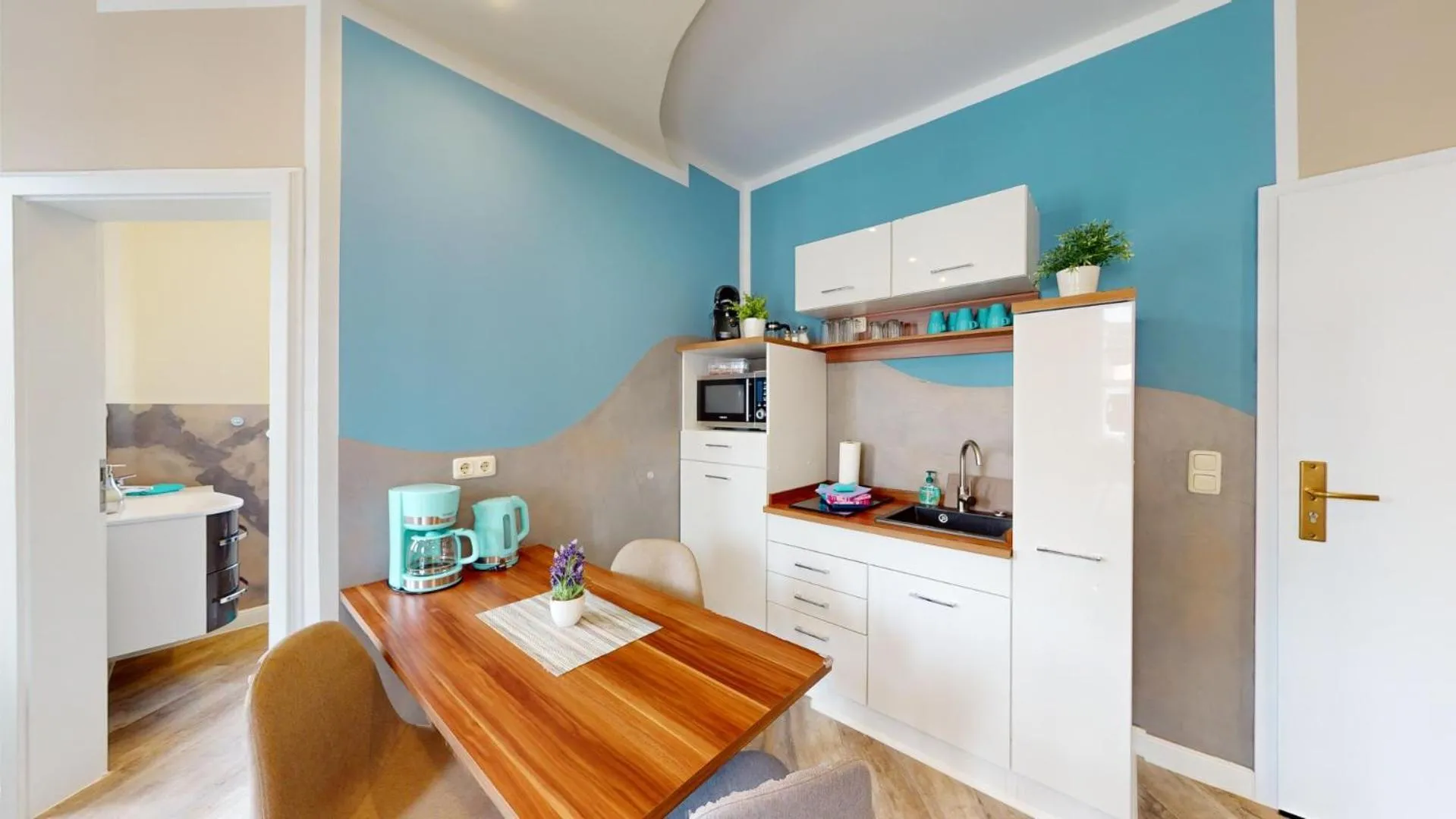 Kitchen or kitchenette in Apartments am Sund