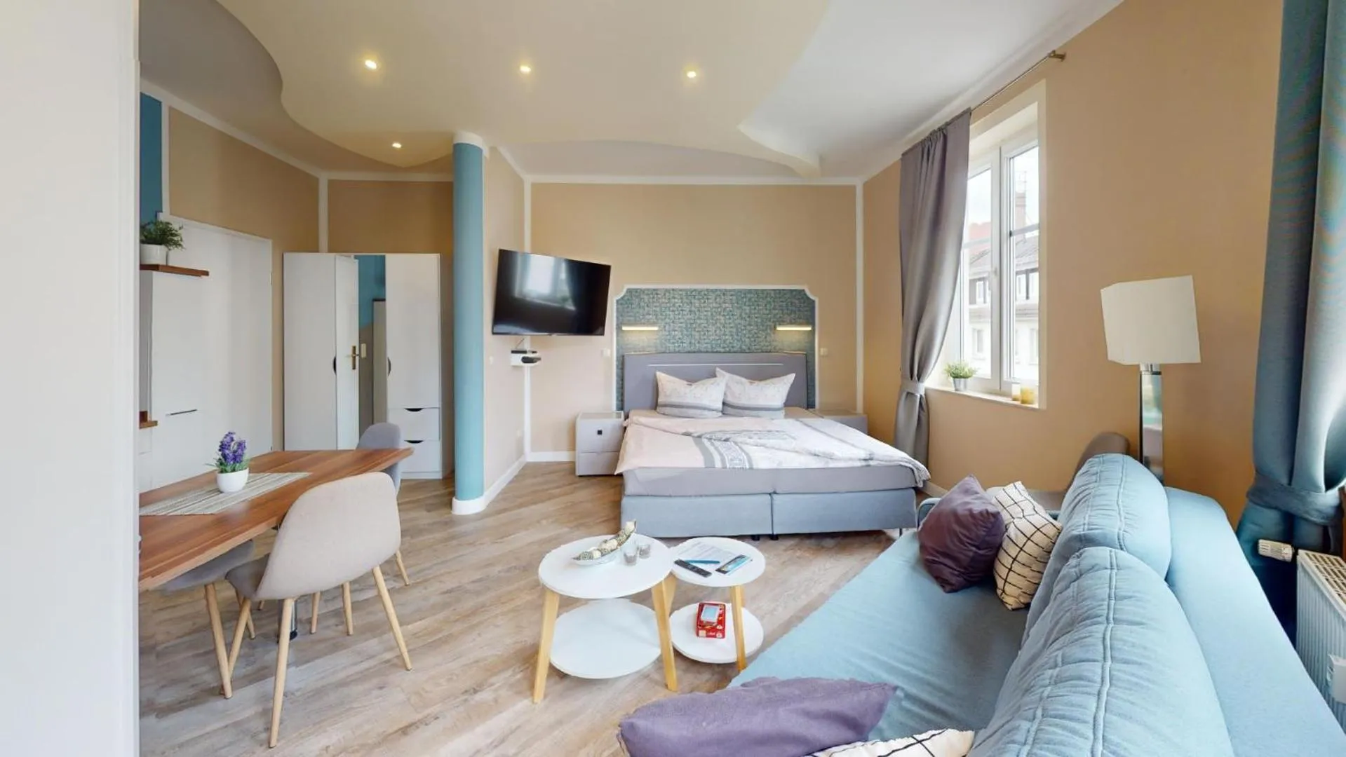 Kitchen or kitchenette, Bed in Apartments am Sund