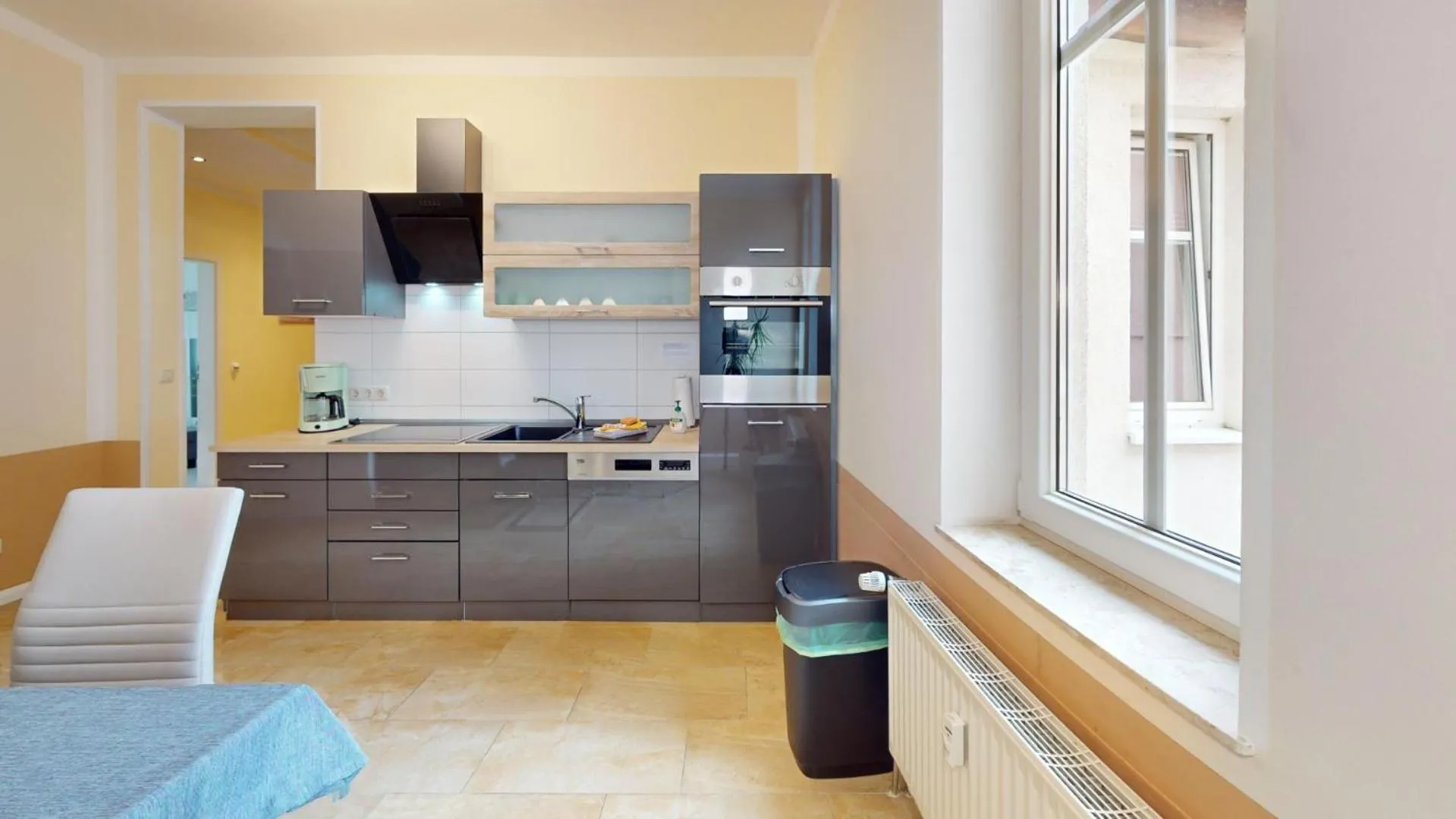 Kitchen or kitchenette in Apartments am Sund
