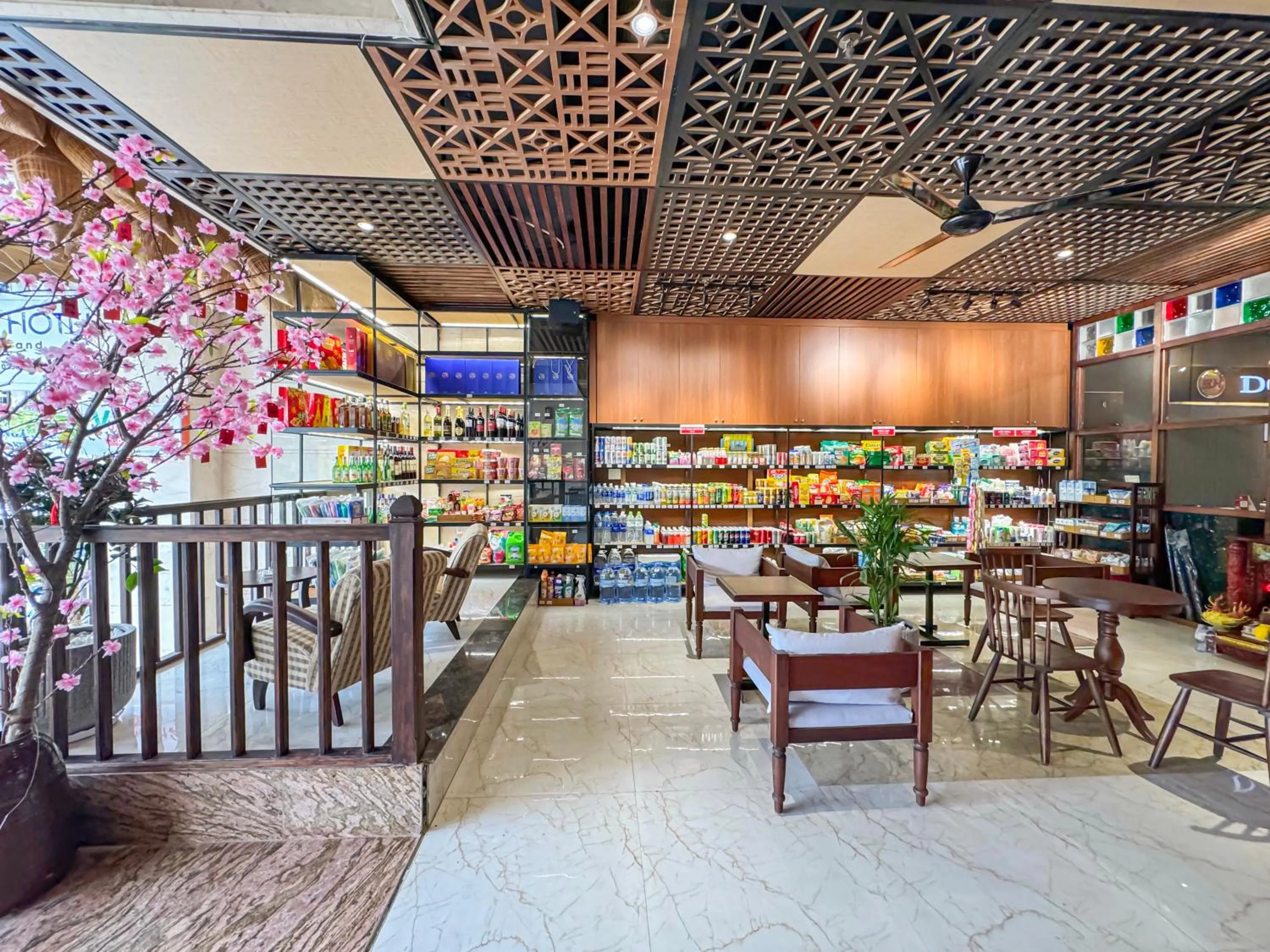 Communal lounge/ TV room in Doha Central Bliss Danang Hotel by Haviland