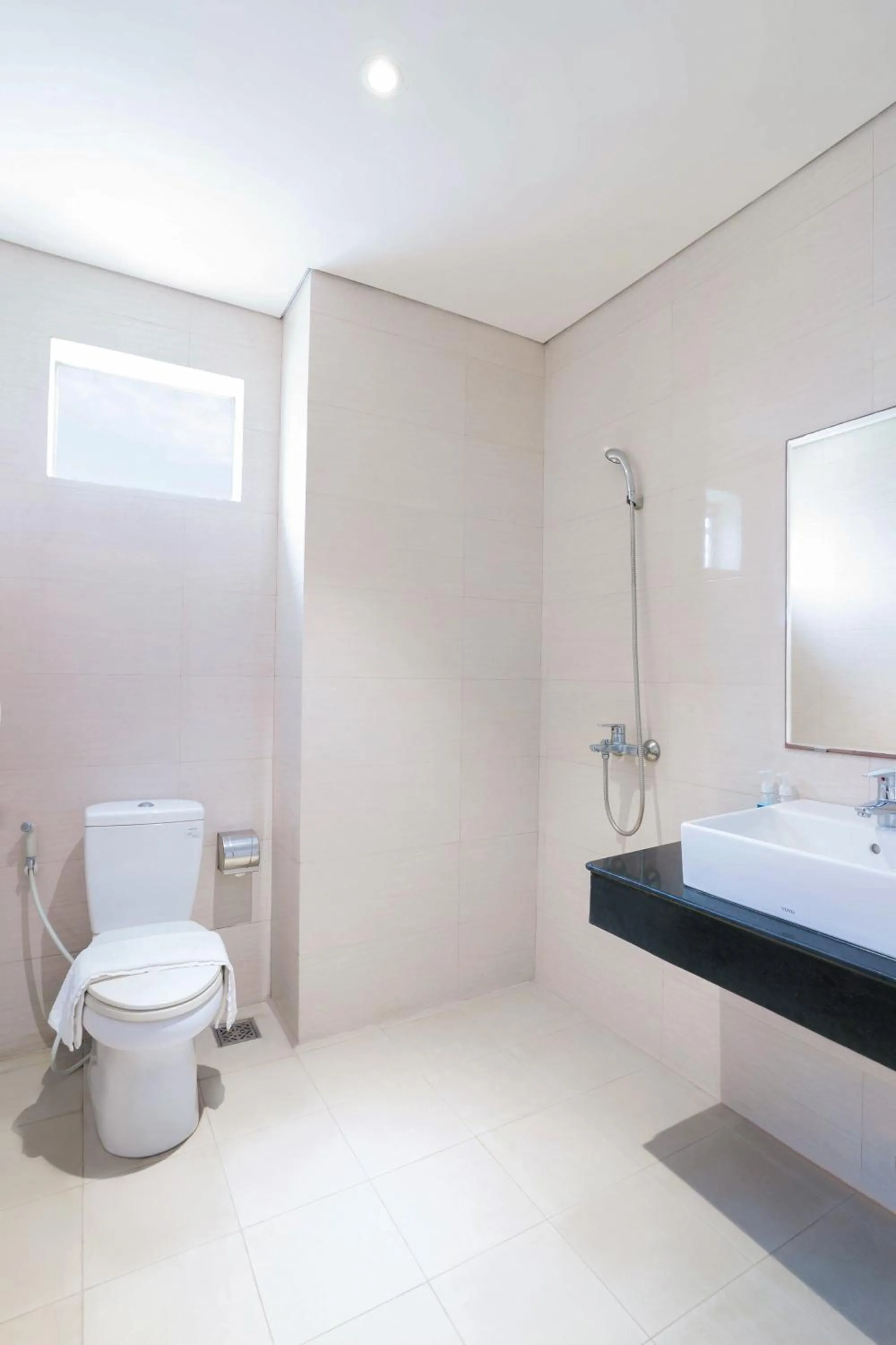 Bathroom in Doha Central Bliss Danang Hotel by Haviland