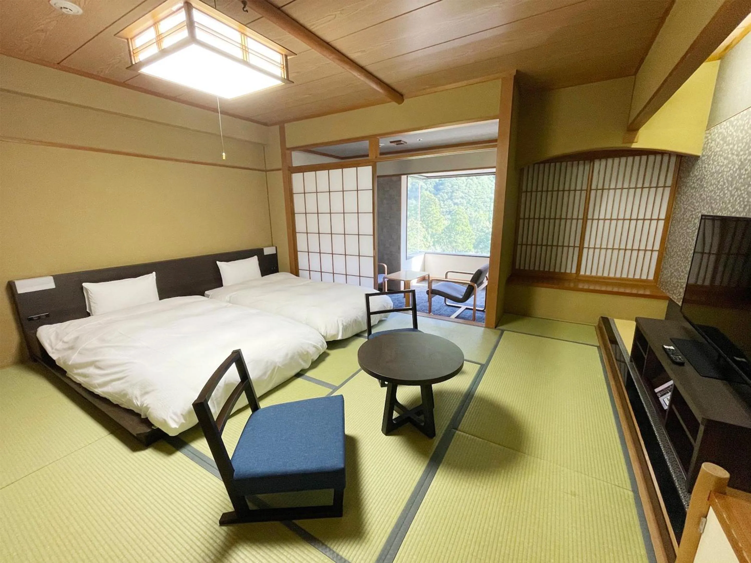 Photo of the whole room, Bed in Grandvrio Hotel Unazukionsen