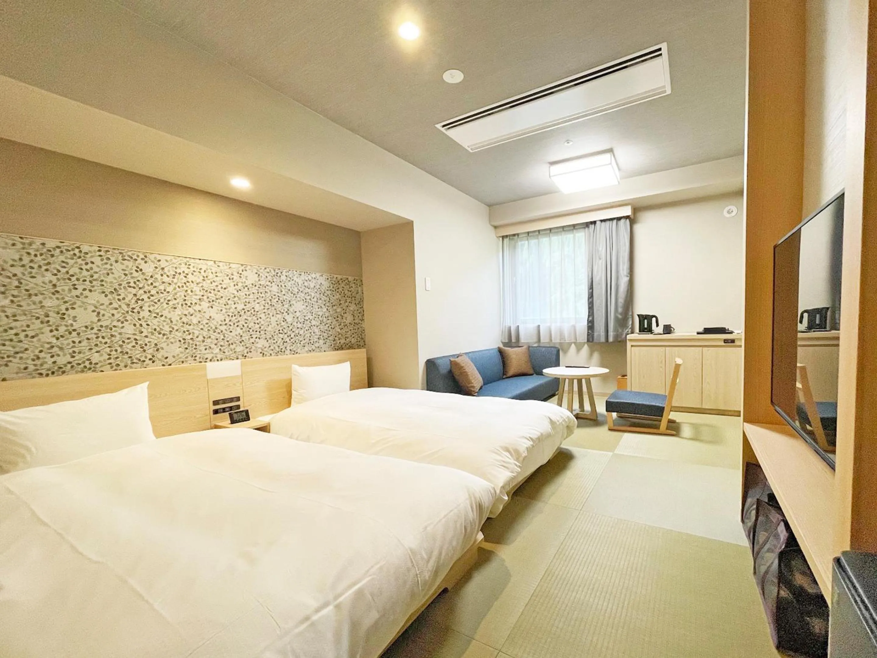 Photo of the whole room, Bed in Grandvrio Hotel Unazukionsen