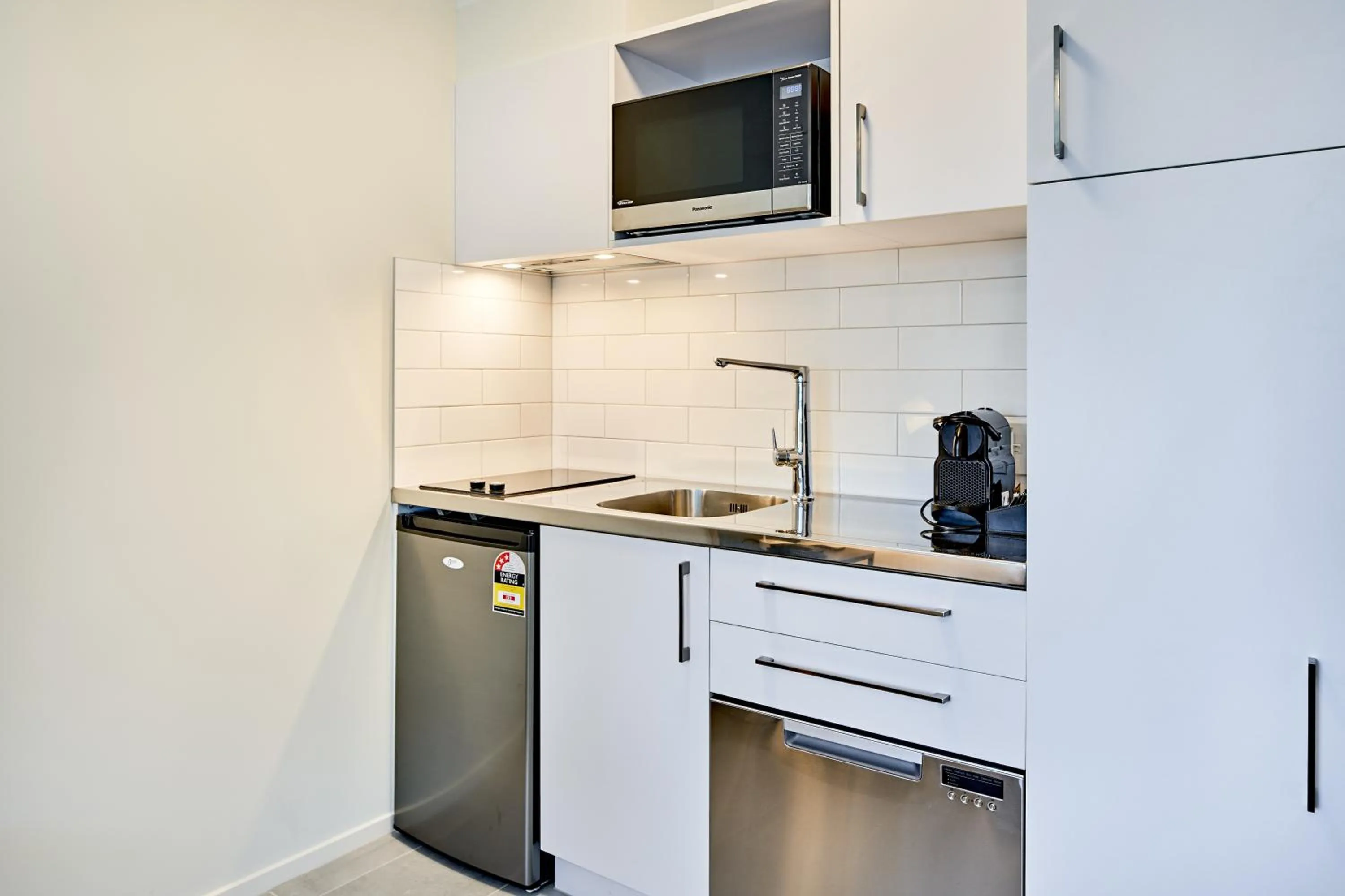 Kitchen or kitchenette in Sojourn Apartment Hotel - Ghuznee