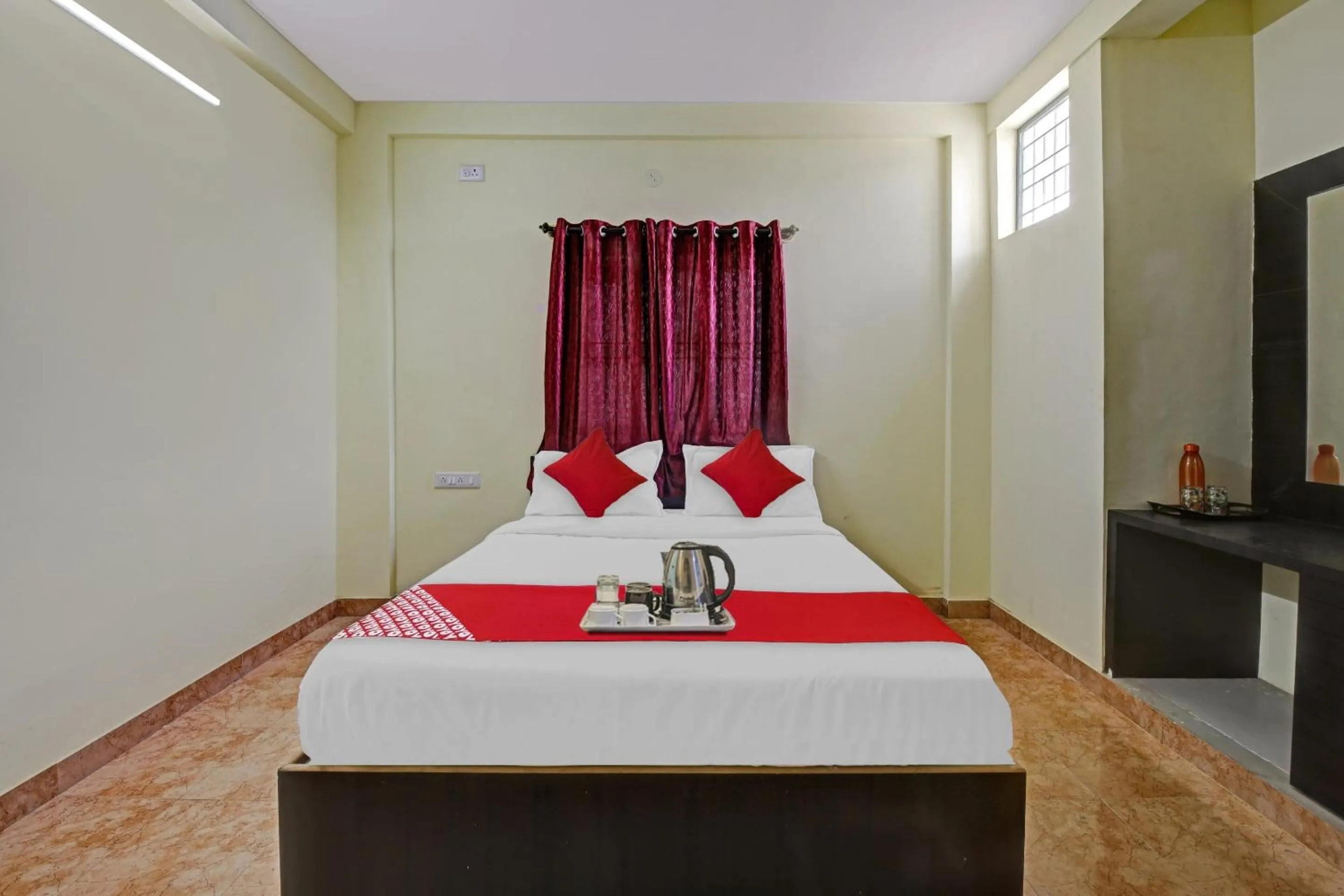 Bedroom in Hotel O Honnagiri Residency