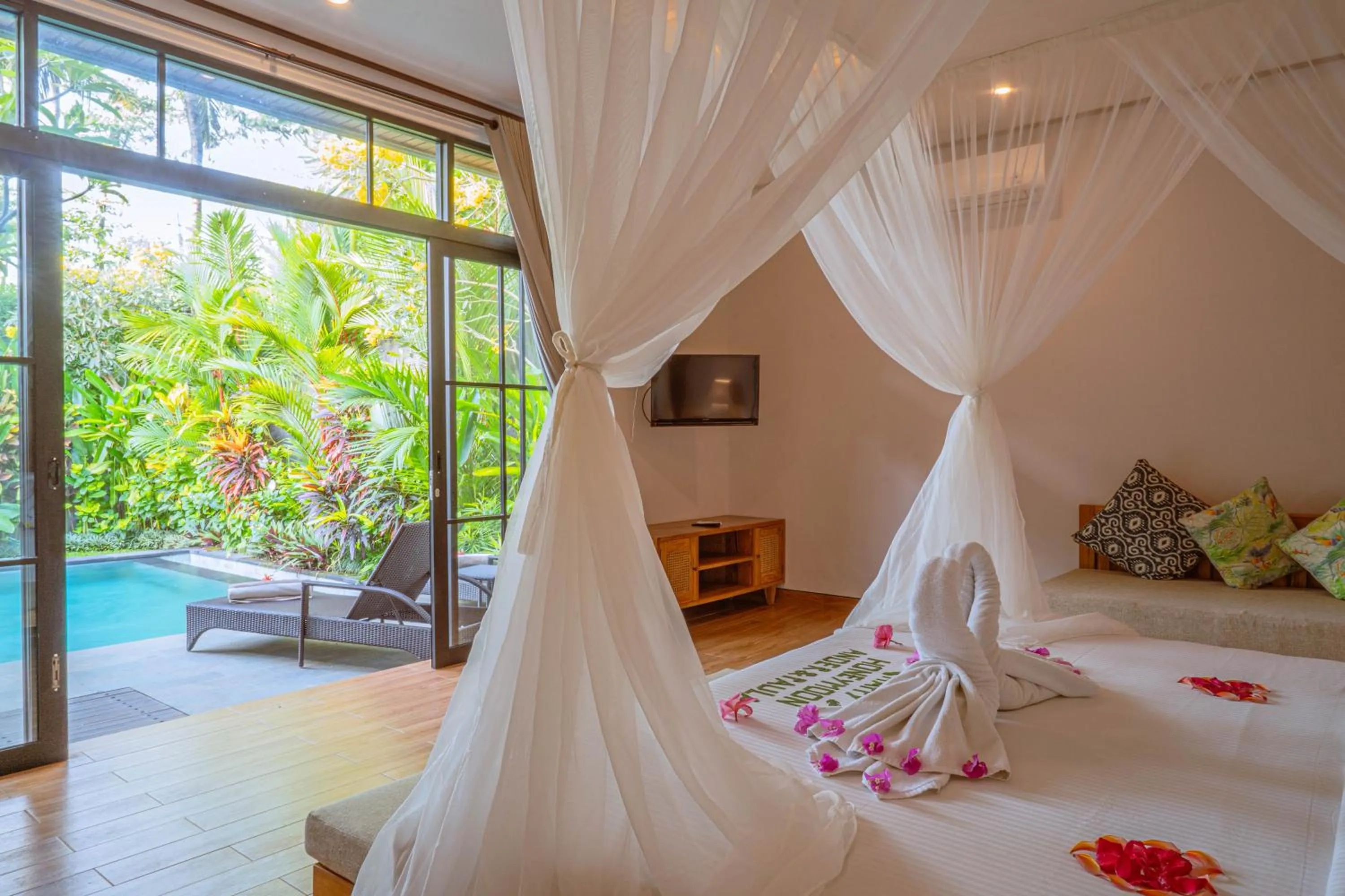 Bed in Sawitri Anandhita Luxury Villas