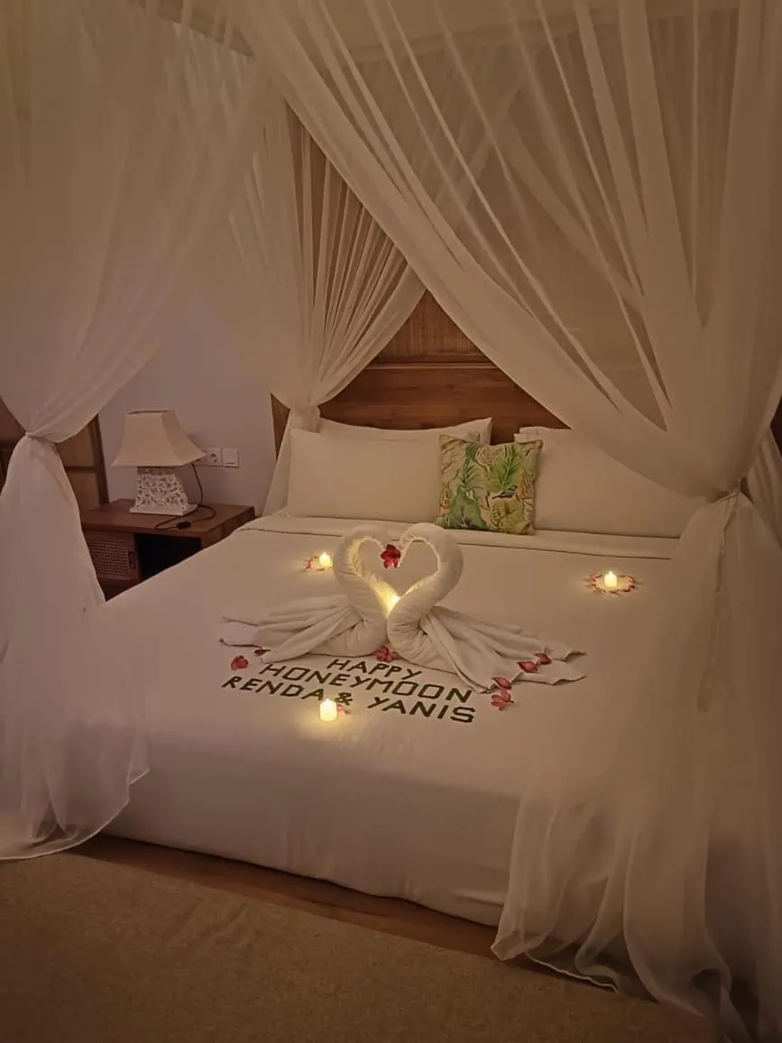 Bed in Sawitri Anandhita Luxury Villas