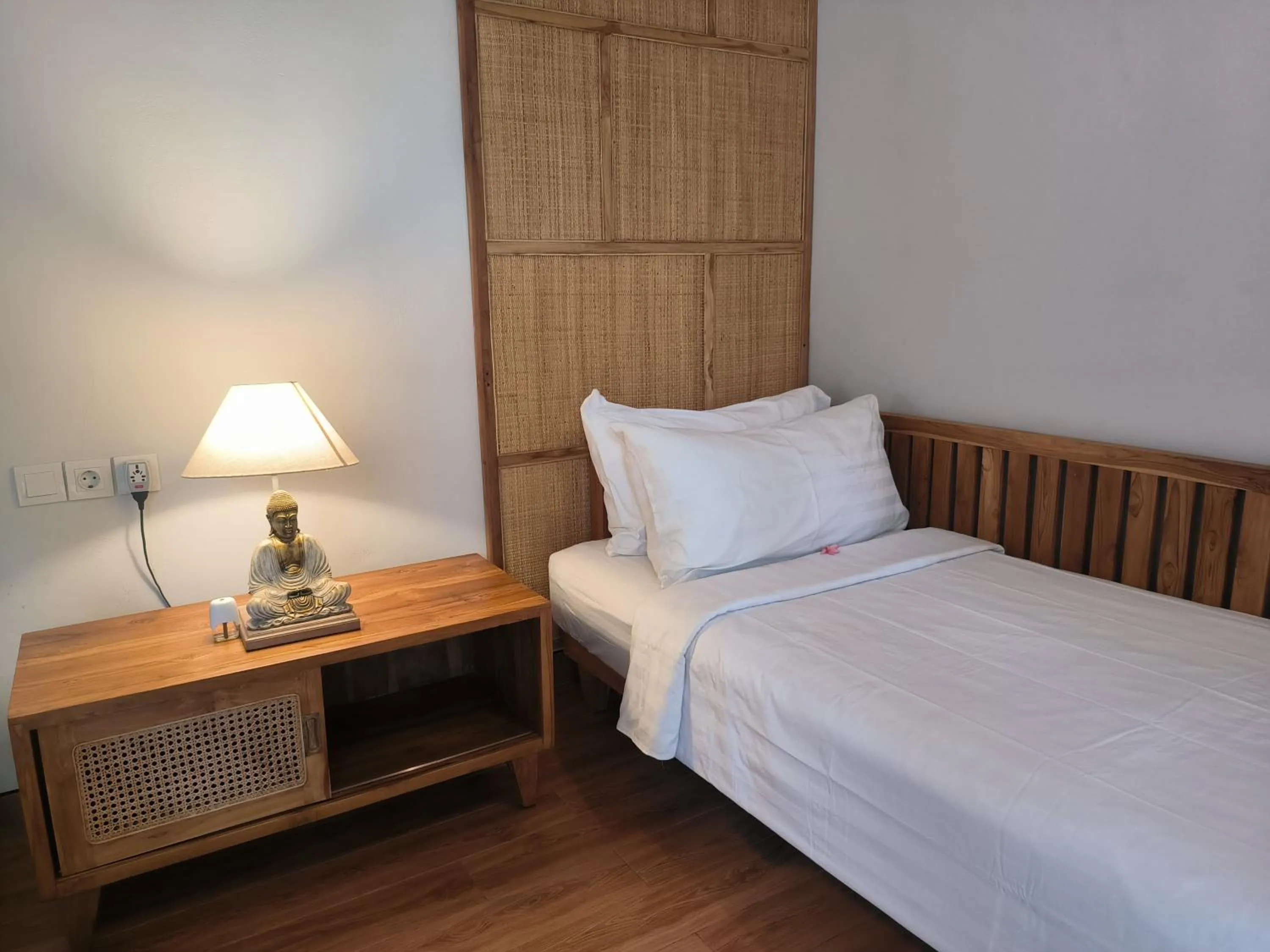 Bed in Sawitri Anandhita Luxury Villas