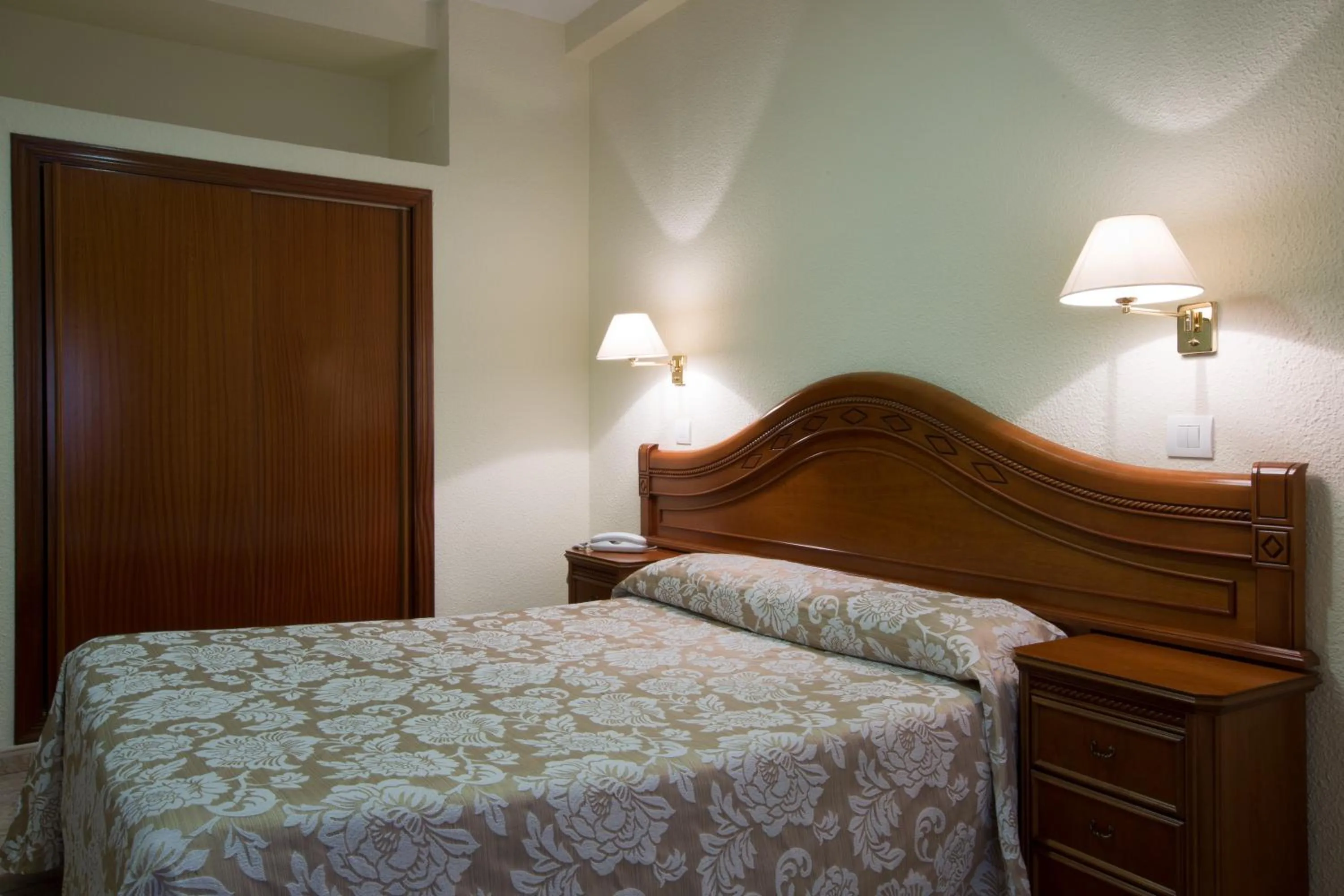 Bed in Hotel Riviera