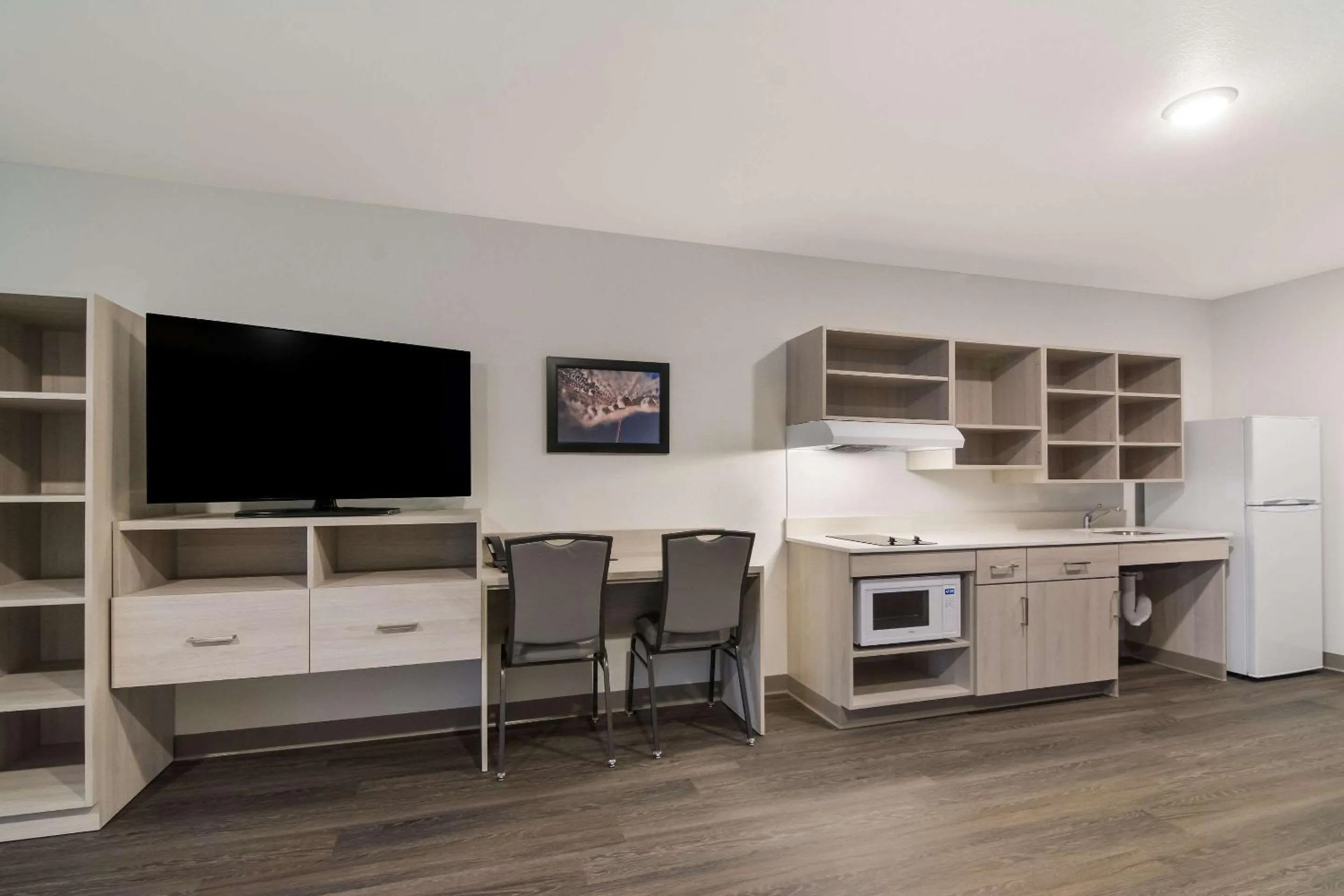 TV and multimedia in WoodSpring Suites Morrisville - Raleigh Durham Airport