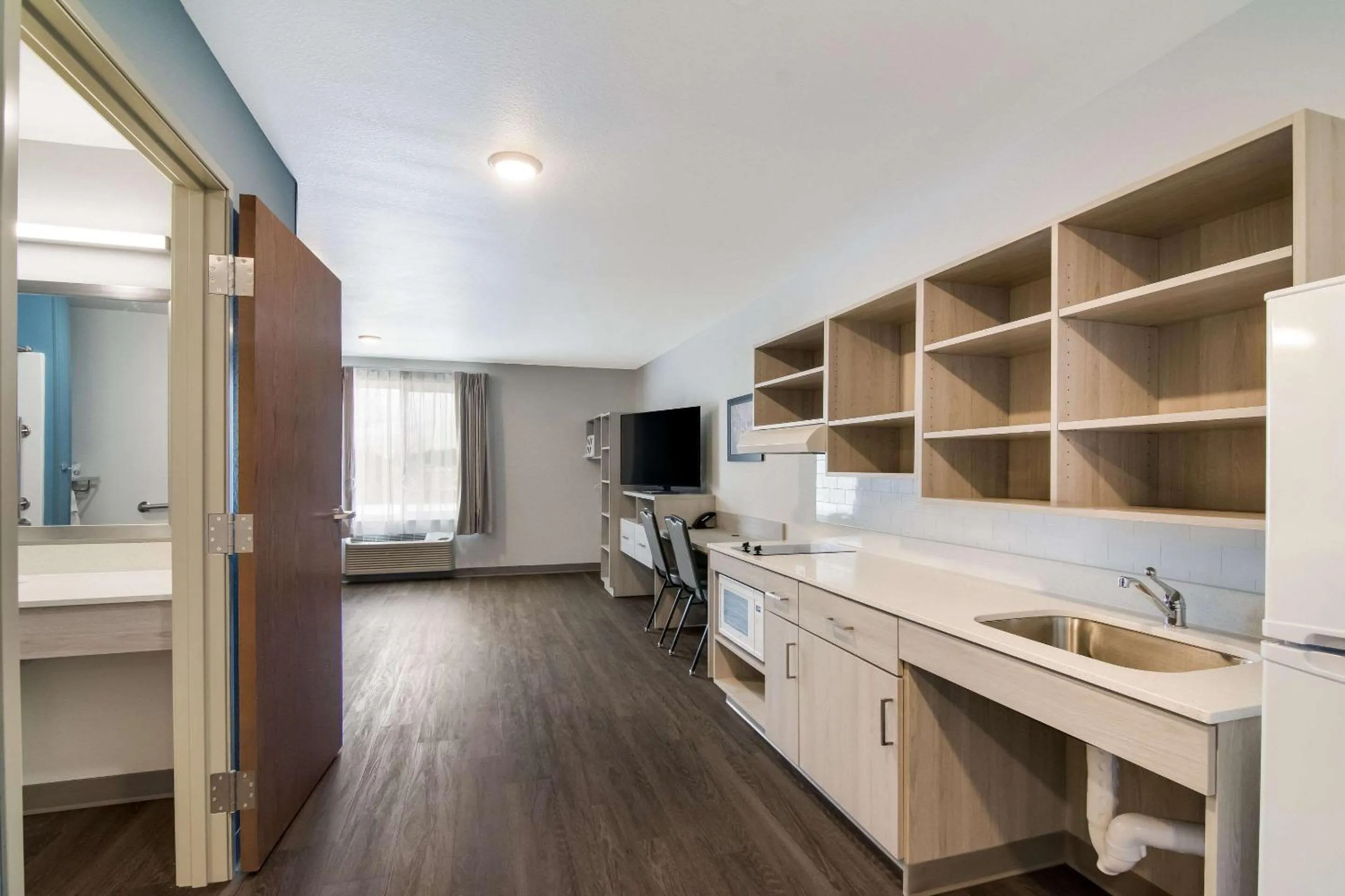 Kitchen or kitchenette in WoodSpring Suites Morrisville - Raleigh Durham Airport