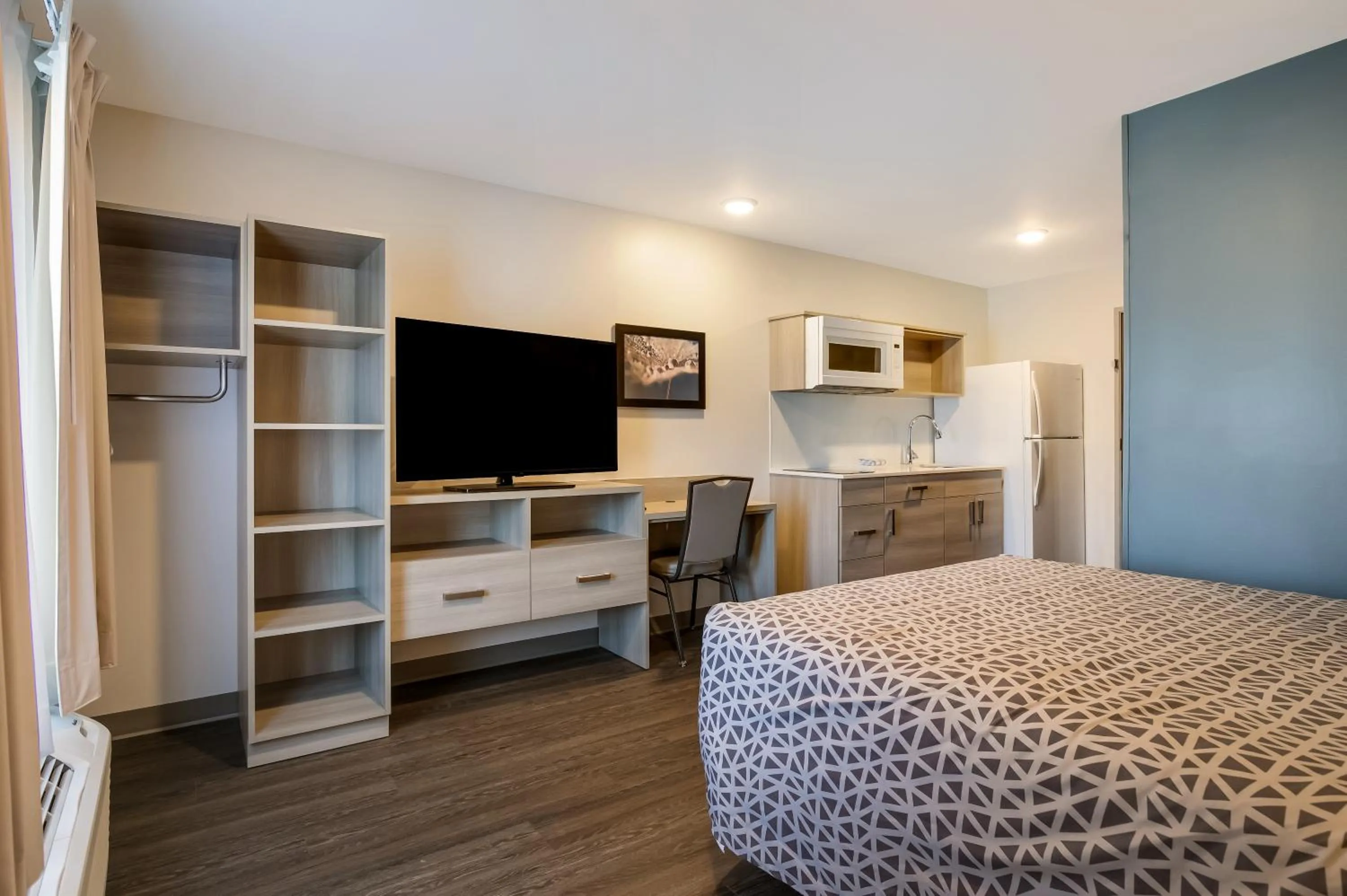 Photo of the whole room, Bed in WoodSpring Suites Morrisville - Raleigh Durham Airport