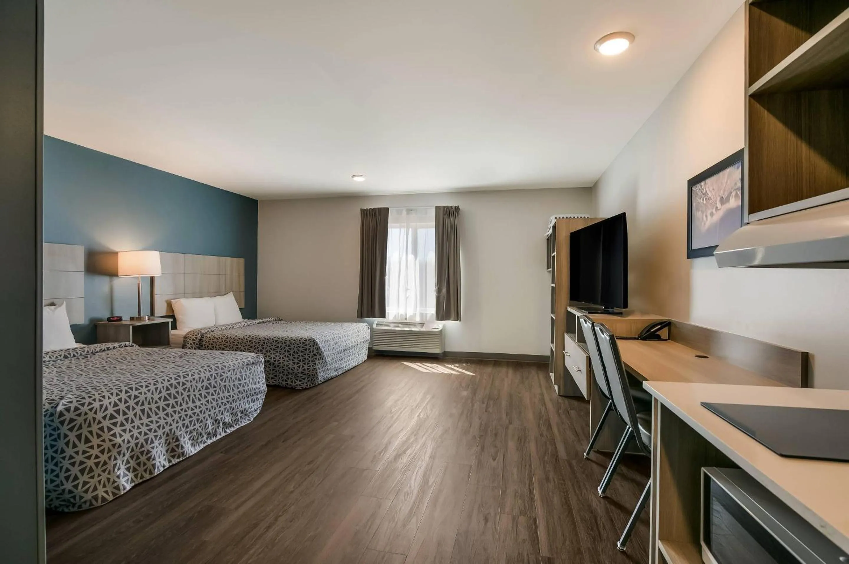 Bedroom, Bed in WoodSpring Suites Knoxville West