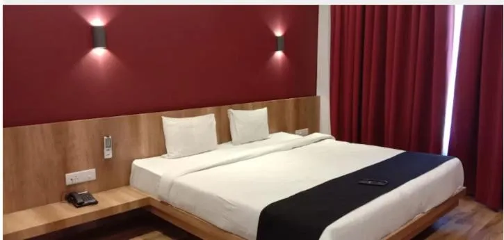 Bed in TGN SUITES - HOTEL