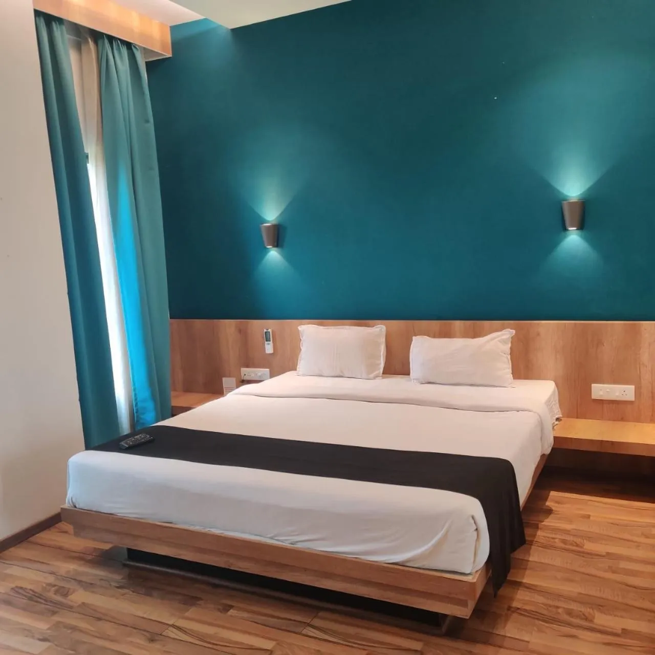 Bed in TGN SUITES - HOTEL