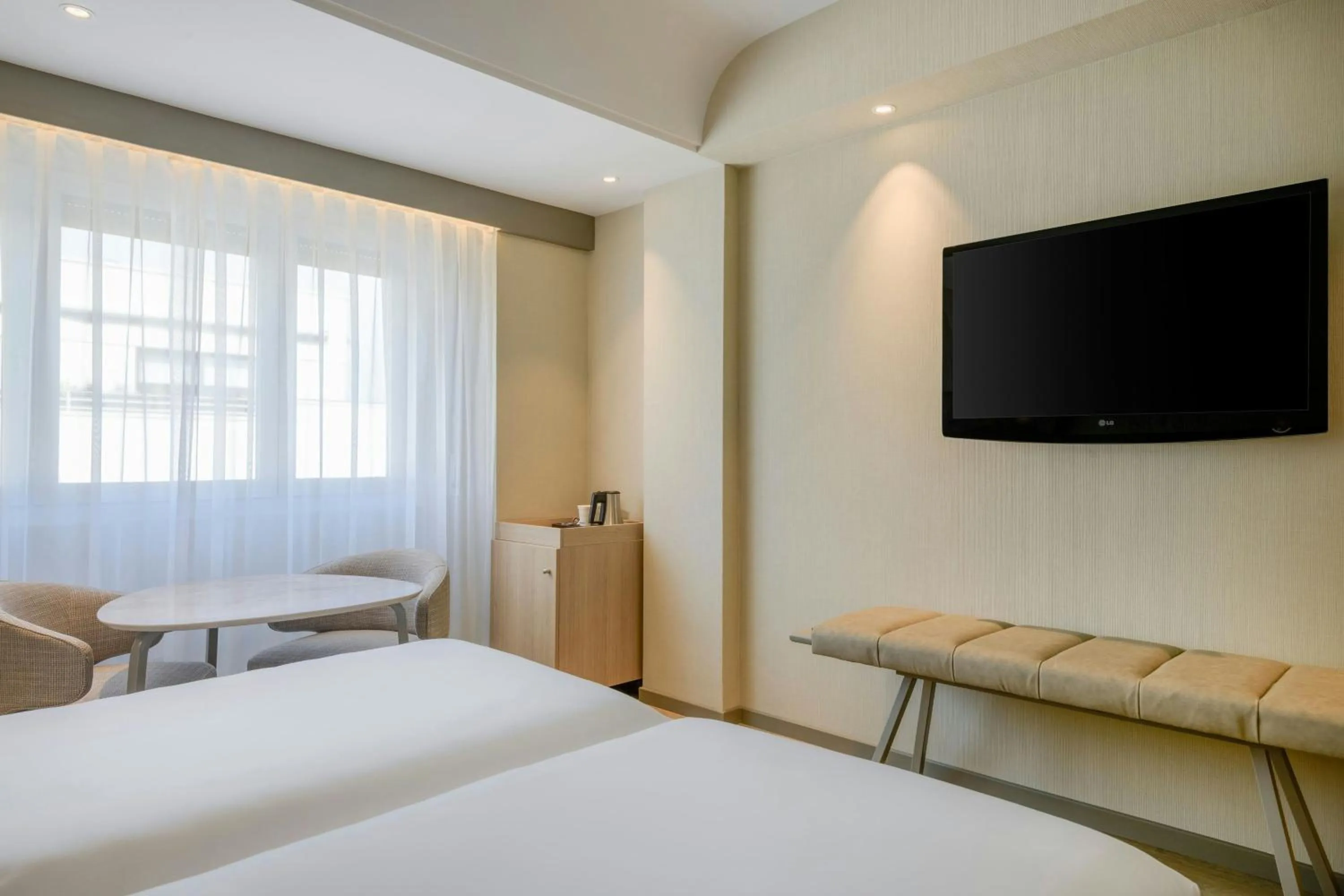 Photo of the whole room, Bed in AC Hotel Carlton Madrid by Marriott