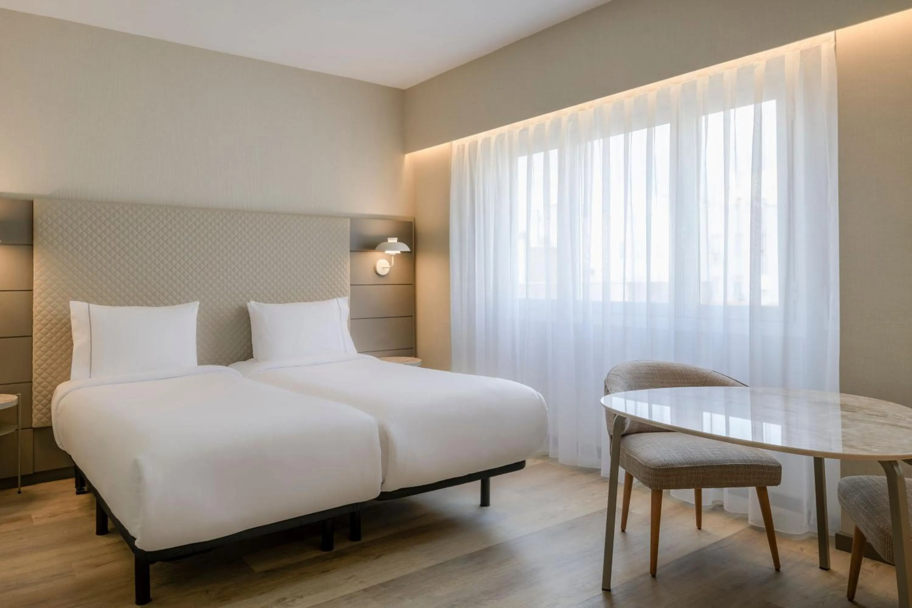 Photo of the whole room, Bed in AC Hotel Carlton Madrid by Marriott