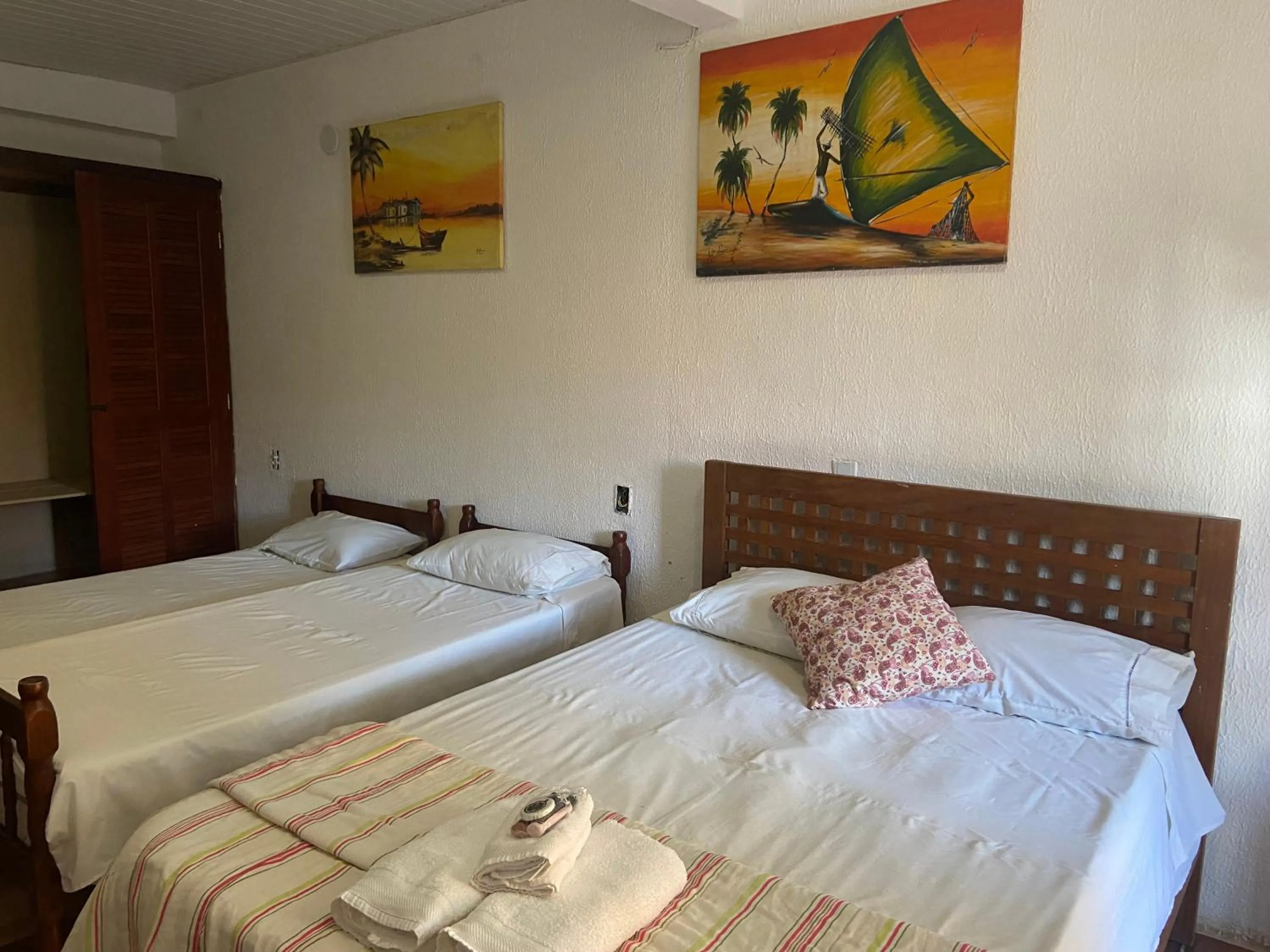 Photo of the whole room, Bed in Pousada Maresias de Geribá