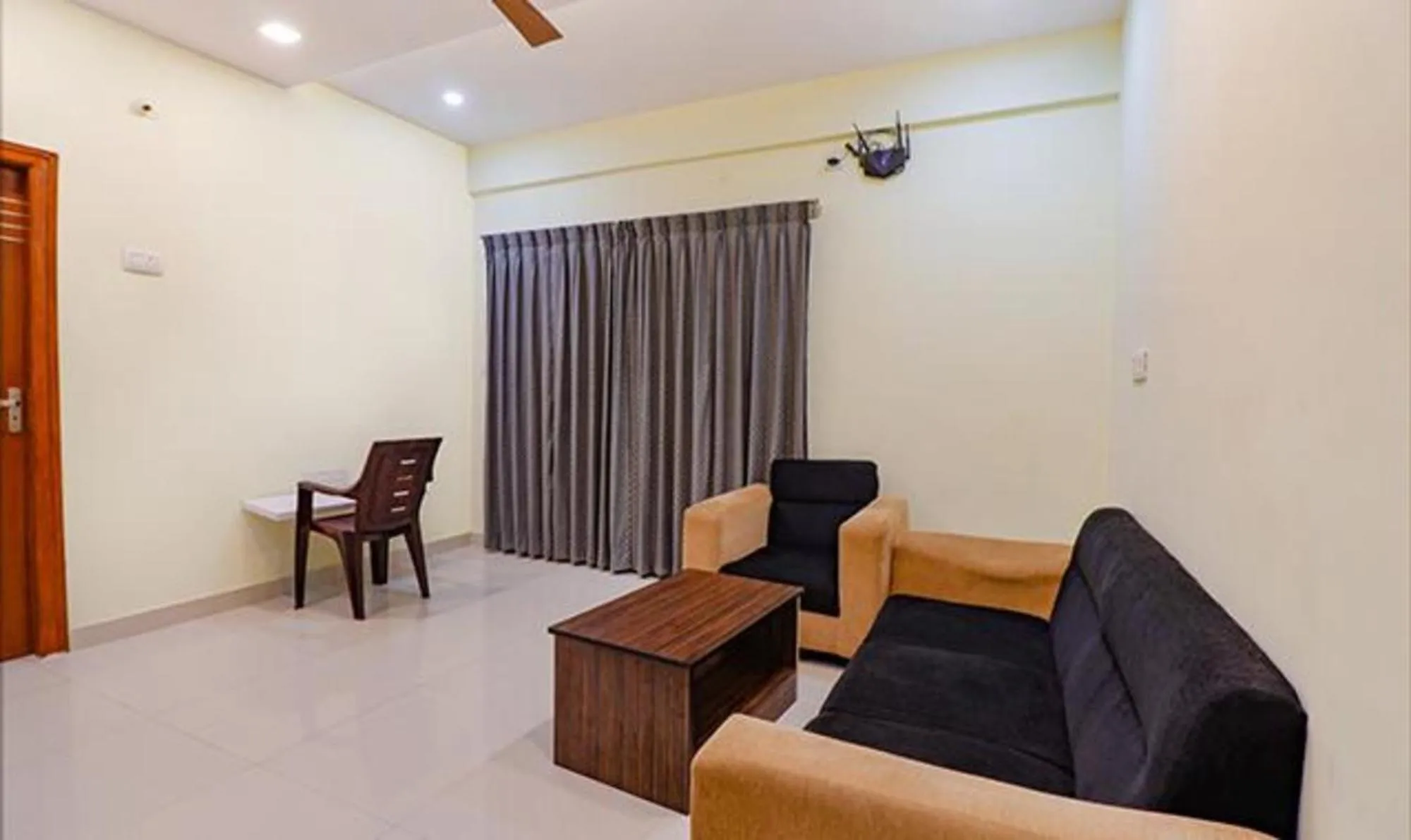 Seating area in Via Kings Suites