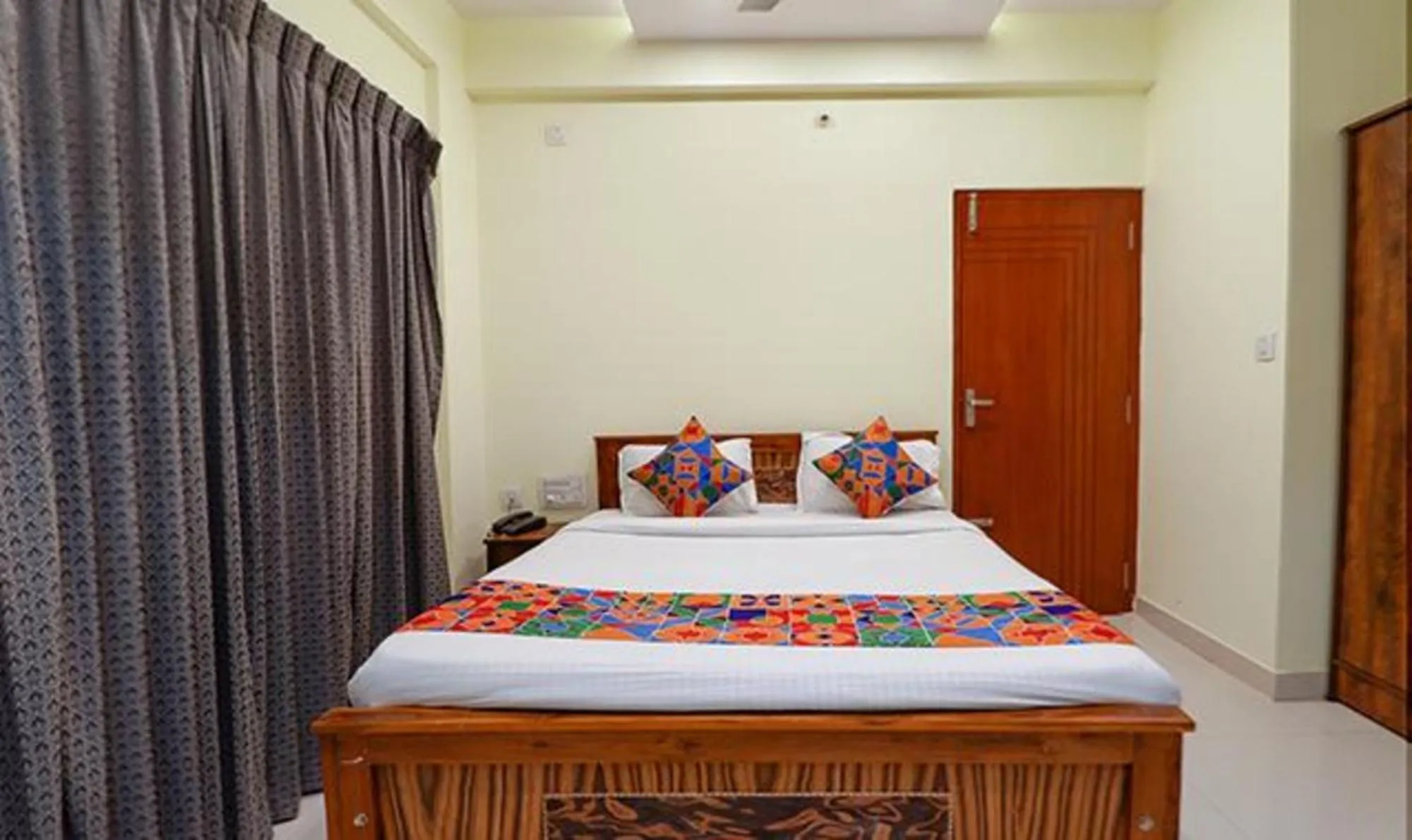 Bed in Via Kings Suites