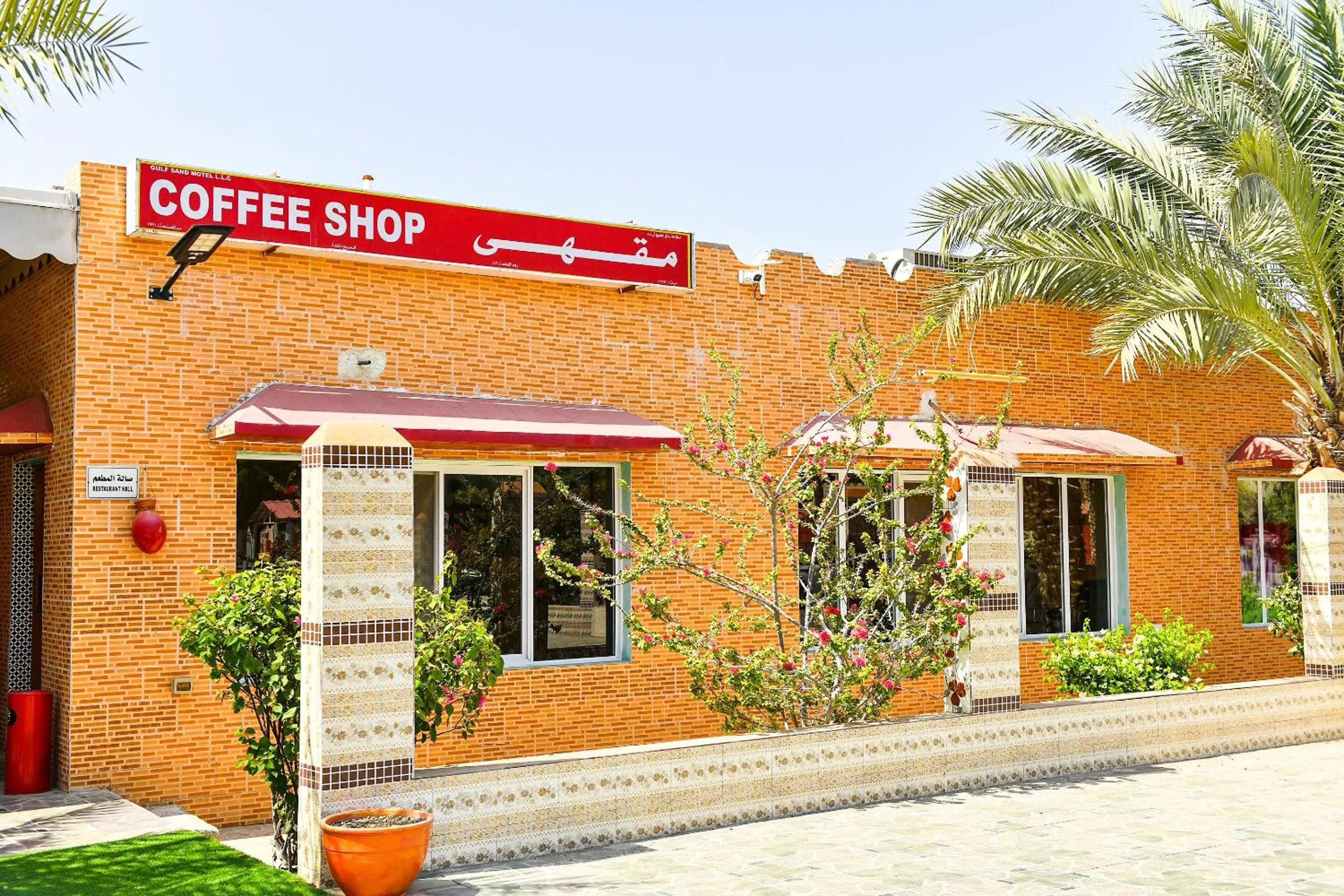 Facade/entrance in OYO 138 Gulf Sand Motel