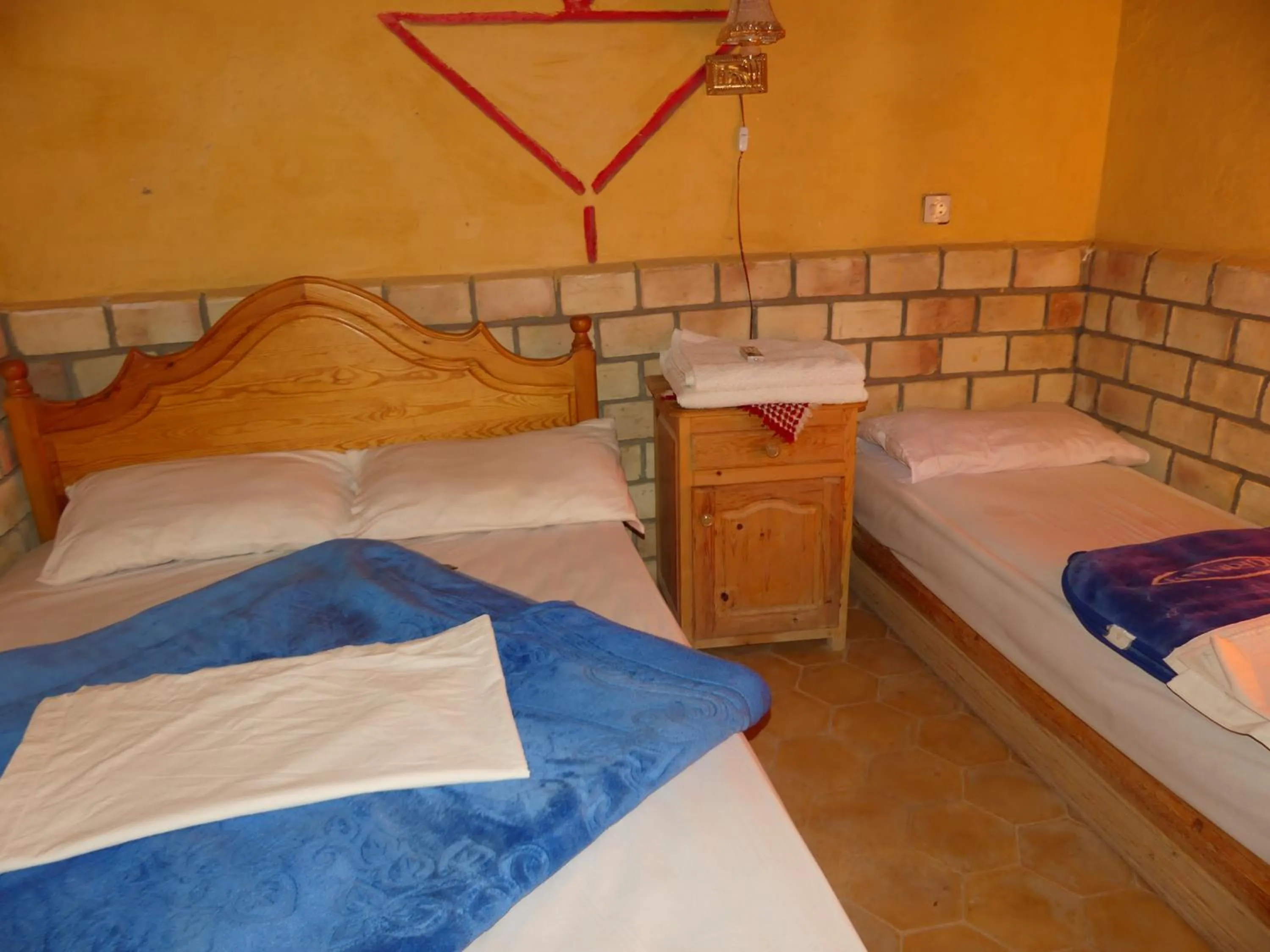 Bed in Les Pyramides Hotel Merzouga