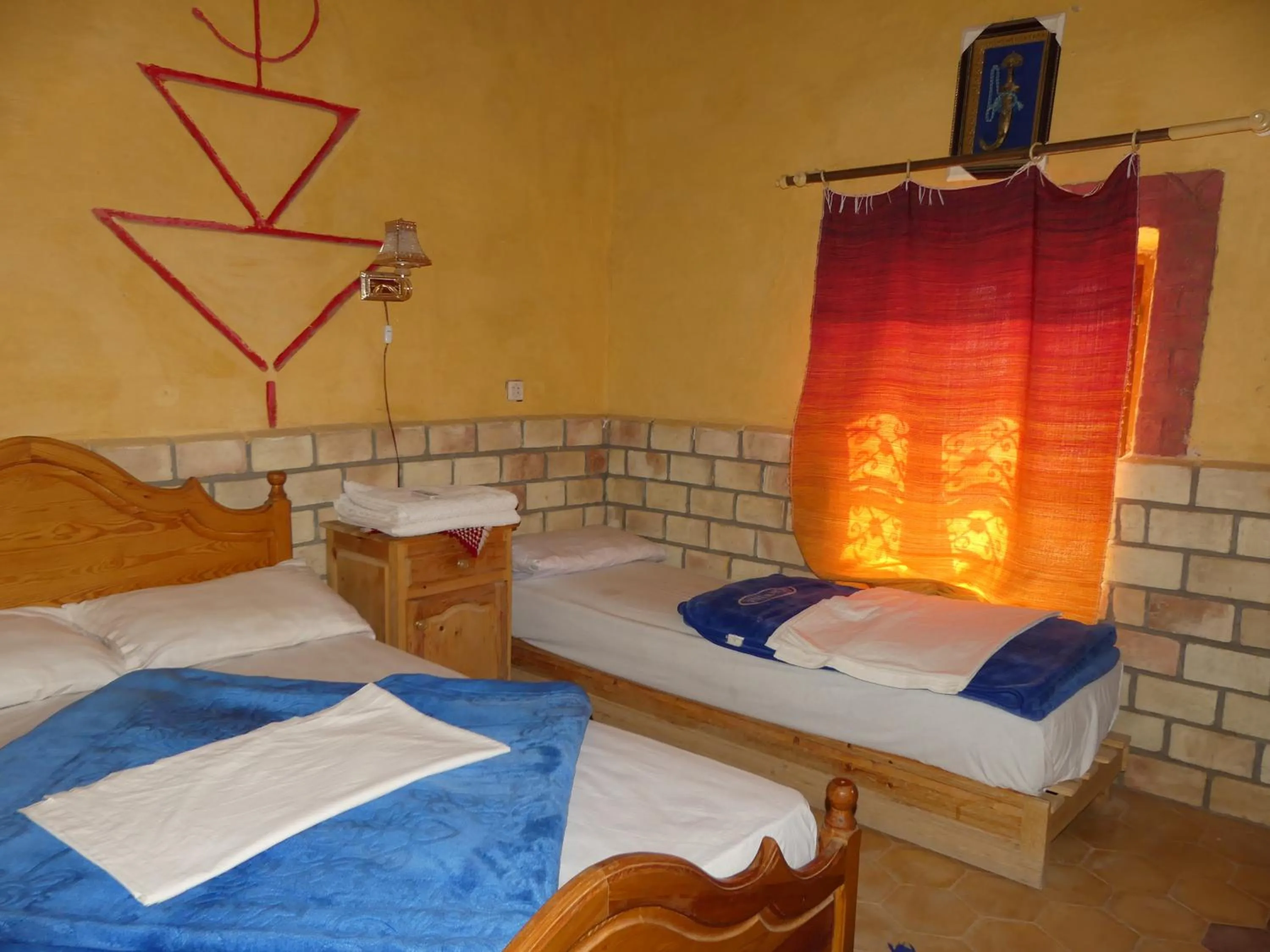 Photo of the whole room, Bed in Les Pyramides Hotel Merzouga