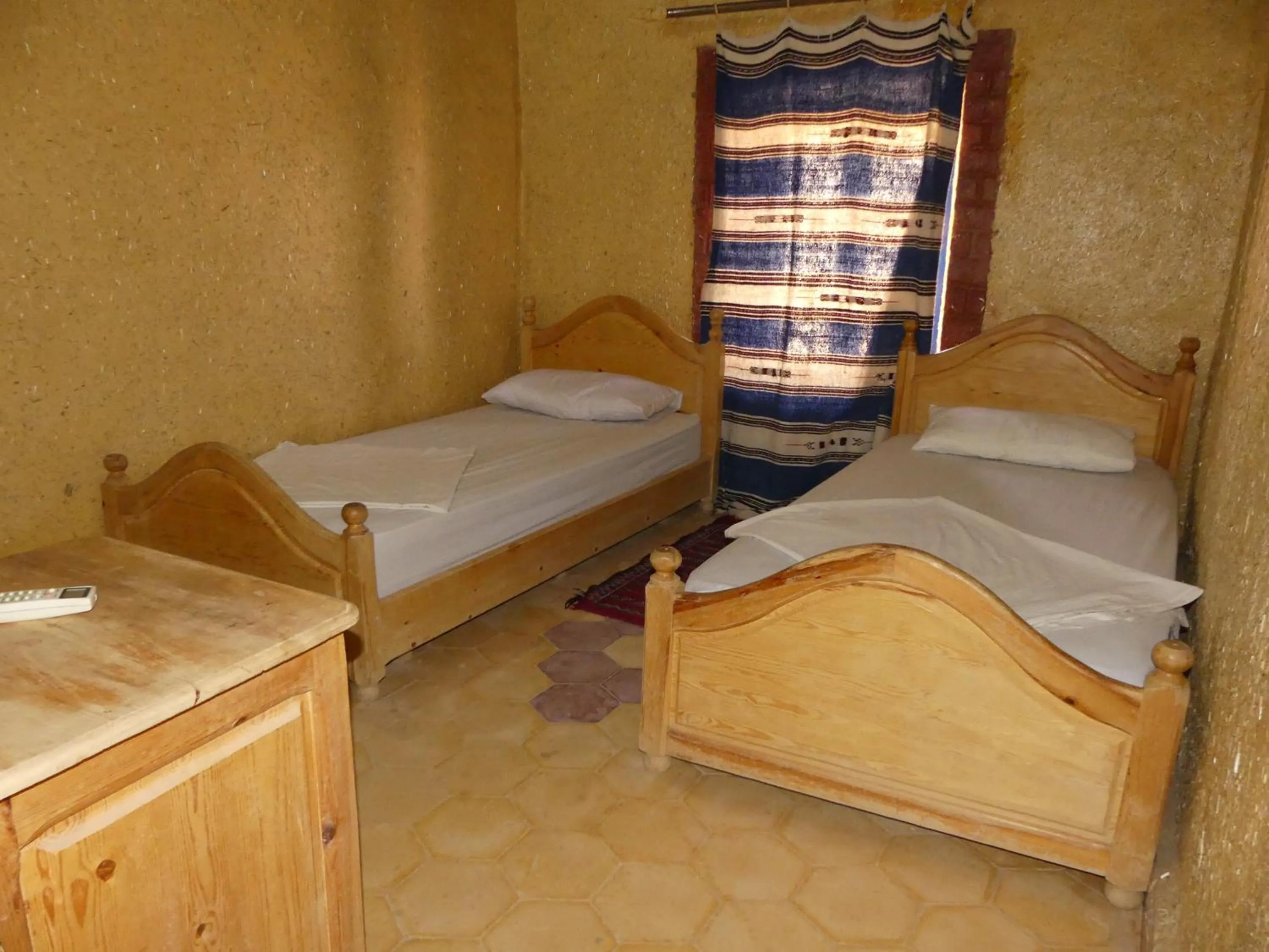 Bed in Les Pyramides Hotel Merzouga