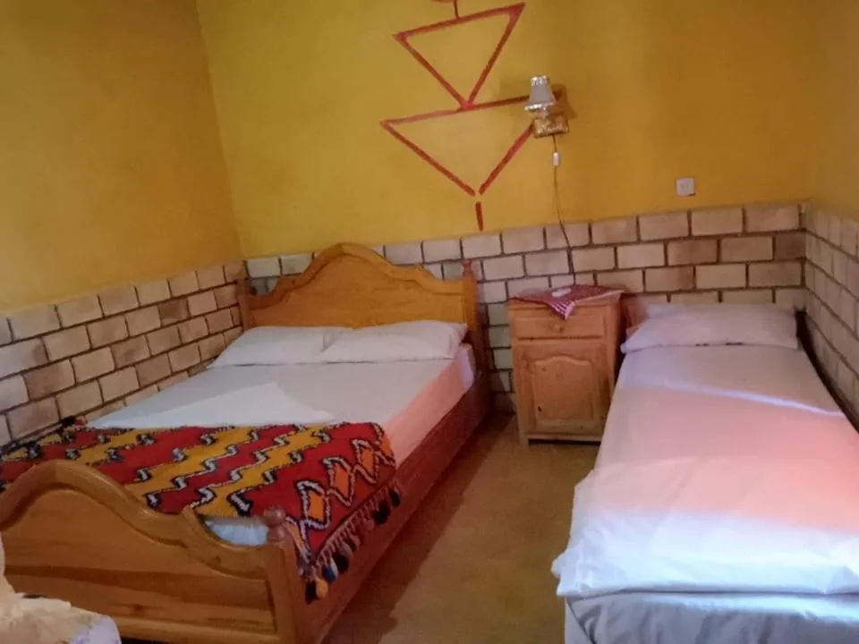 Bed in Les Pyramides Hotel Merzouga