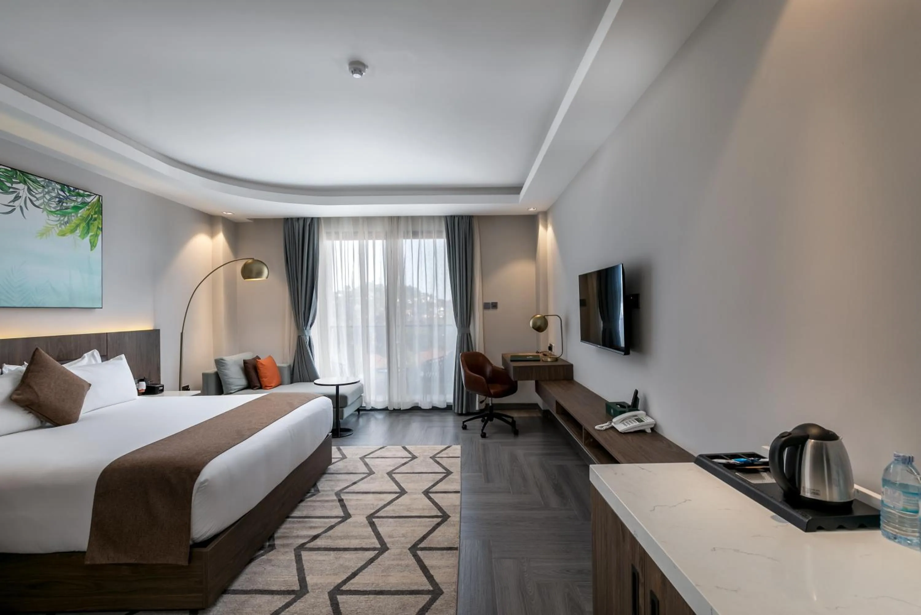 Bed in Zara Garden Hotel and Apartments