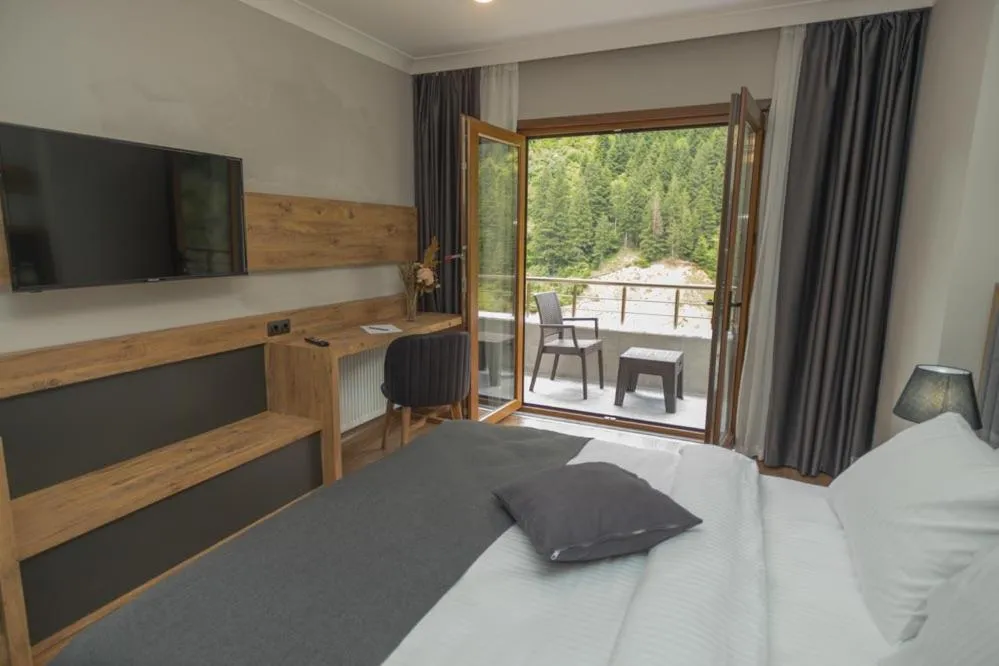 Bed in PAZARCIK MOUNTAIN HOTEL