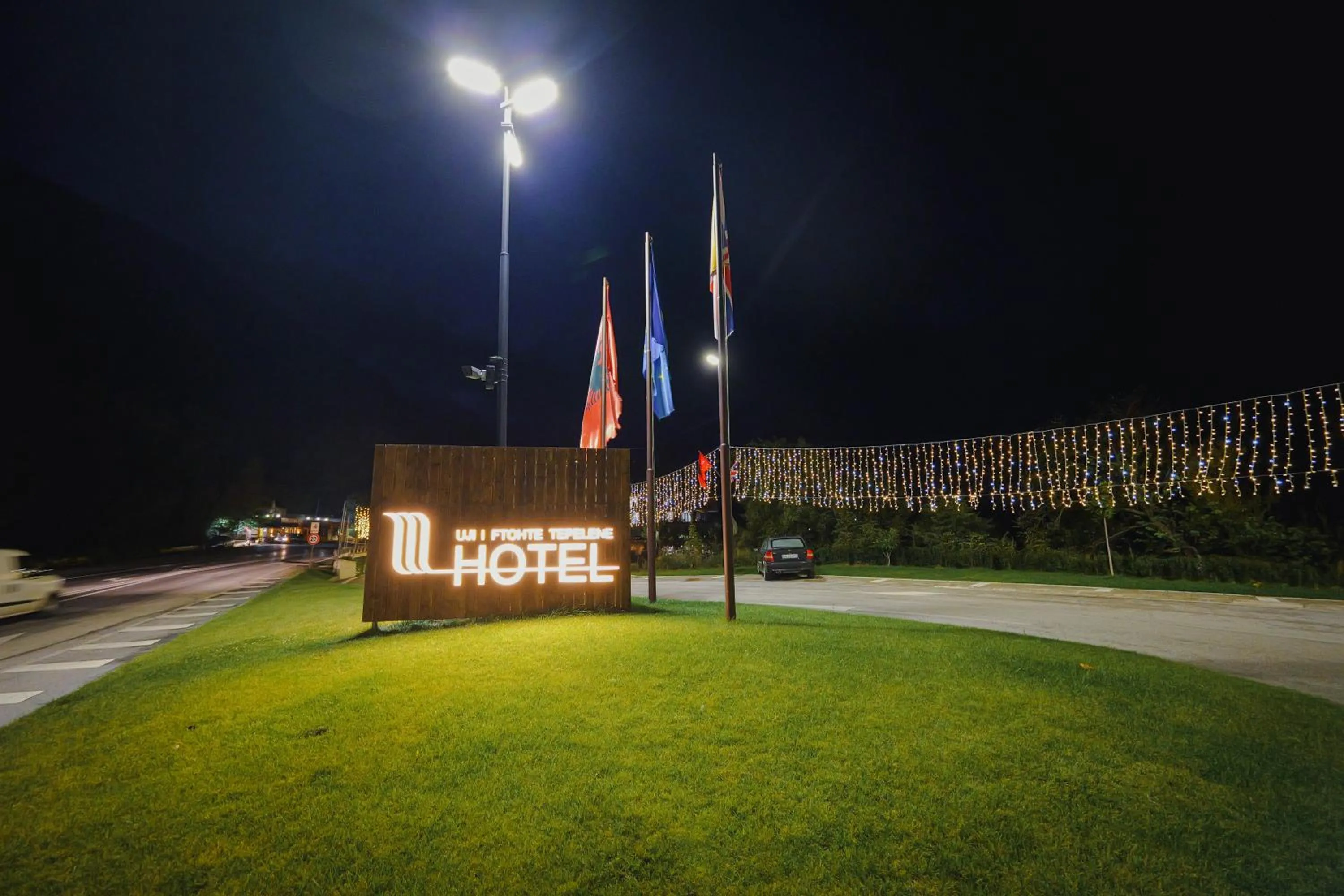 Property logo or sign in Hotel Uji Ftohte Tepelene