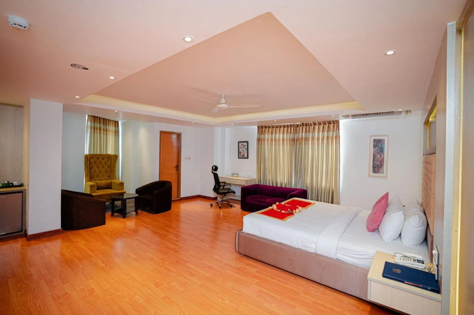 Bed in Royal Raj Hotel