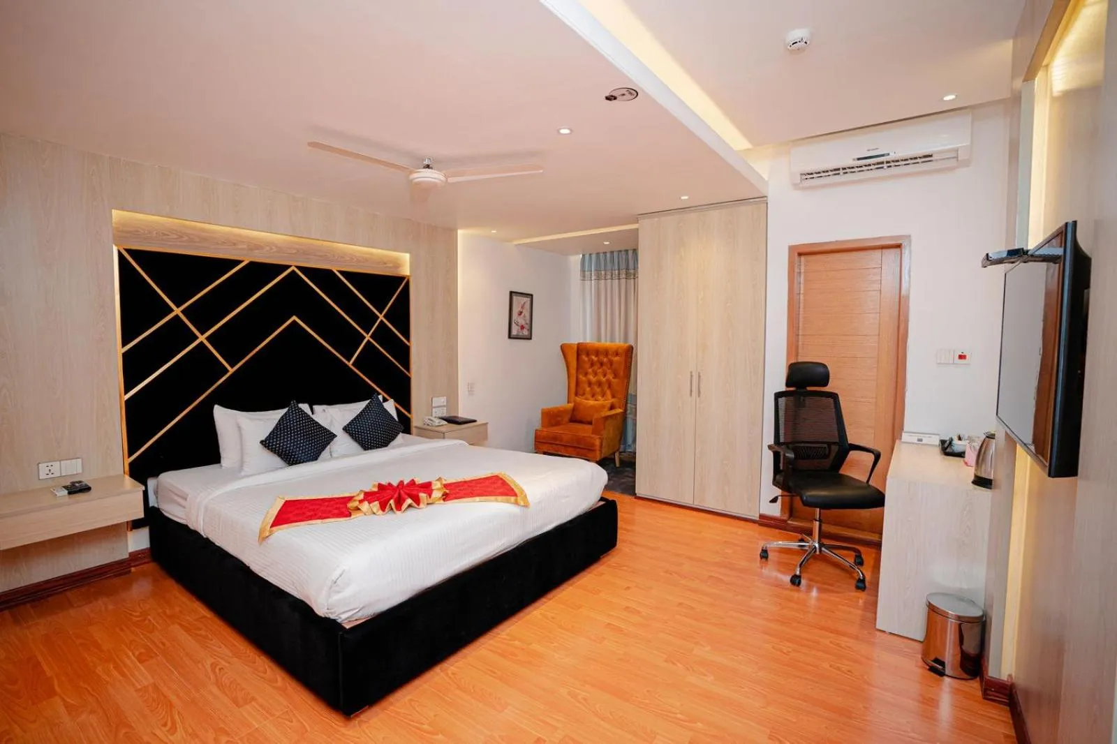 Bed in Royal Raj Hotel