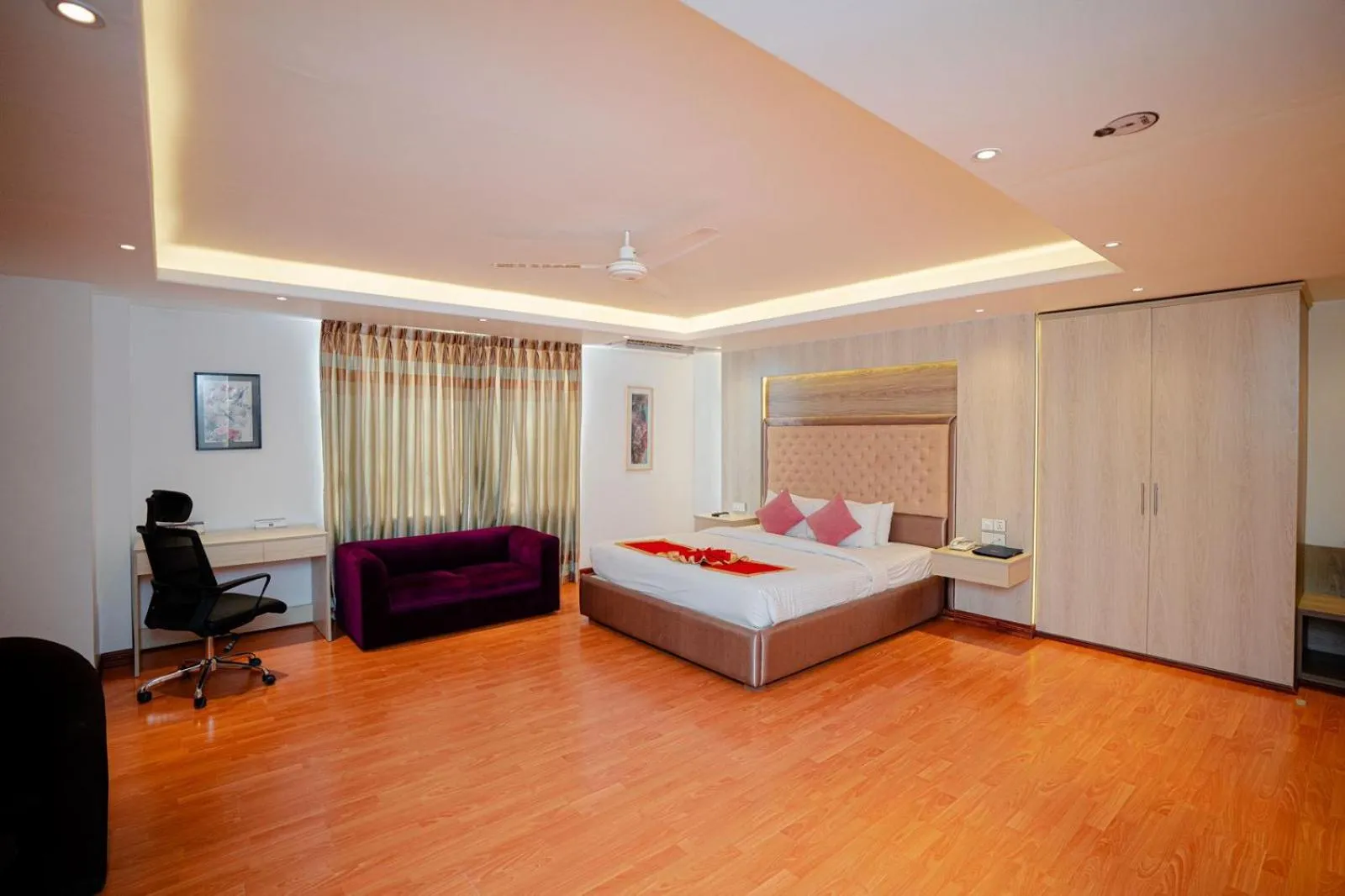 Bed in Royal Raj Hotel