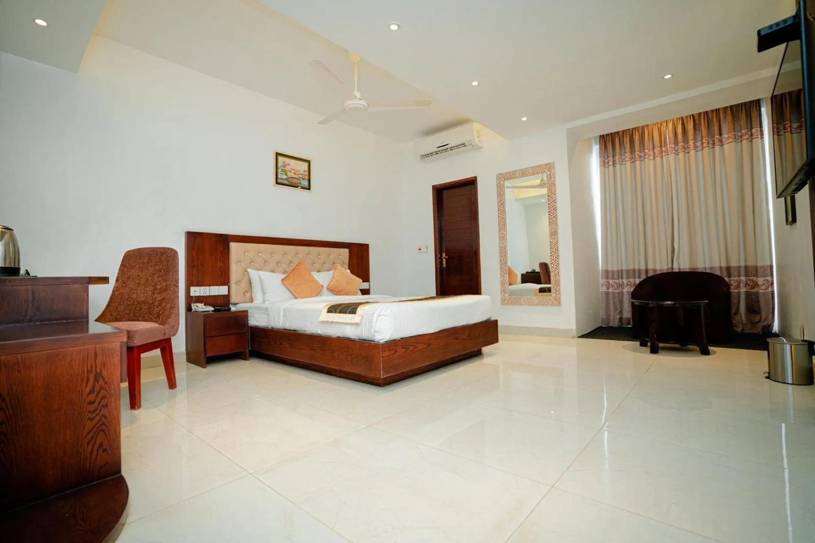 Bed in Royal Raj Hotel