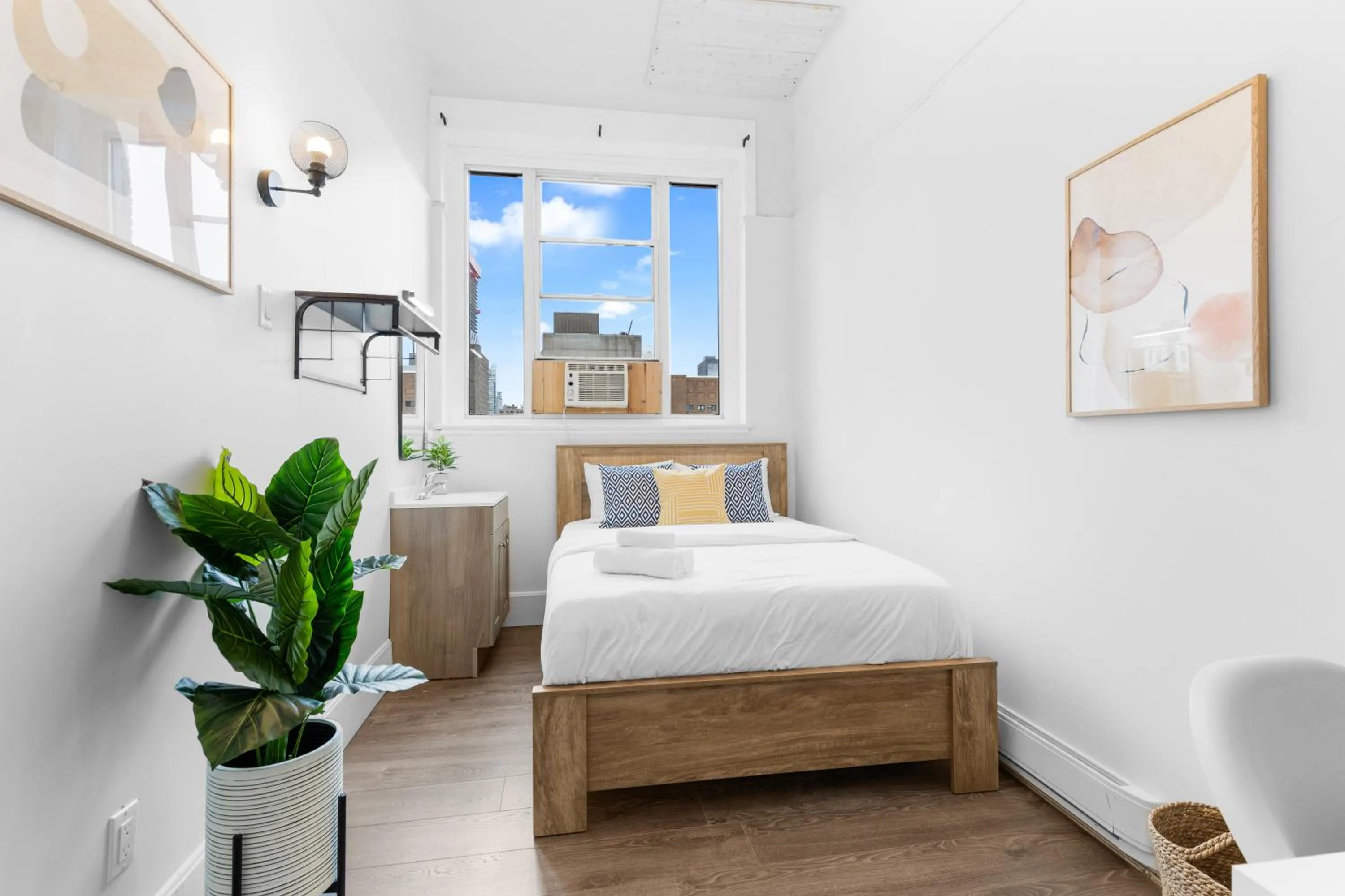 Bed in Le Sand & Stone Hotel