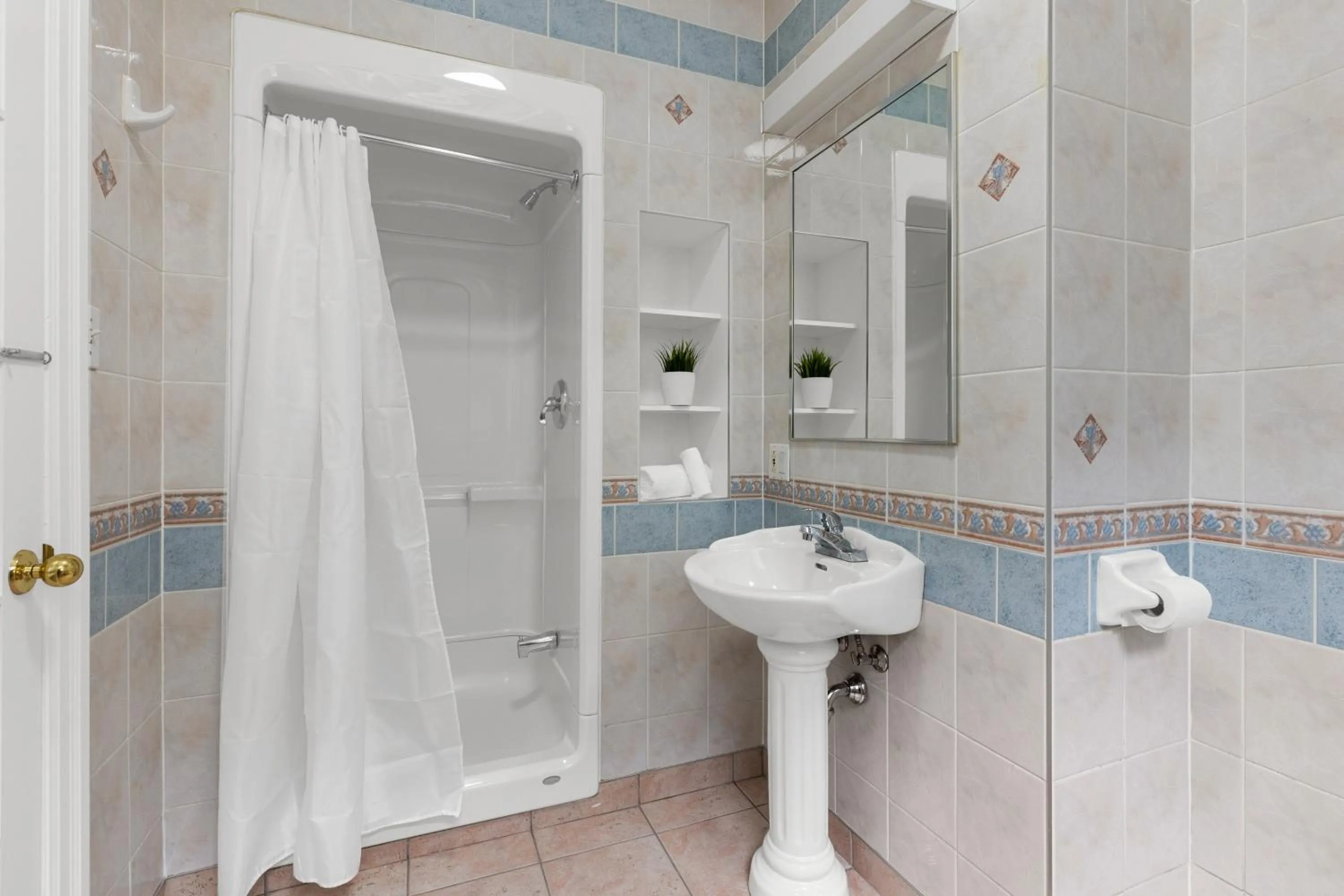 Bathroom in Le Sand & Stone Hotel