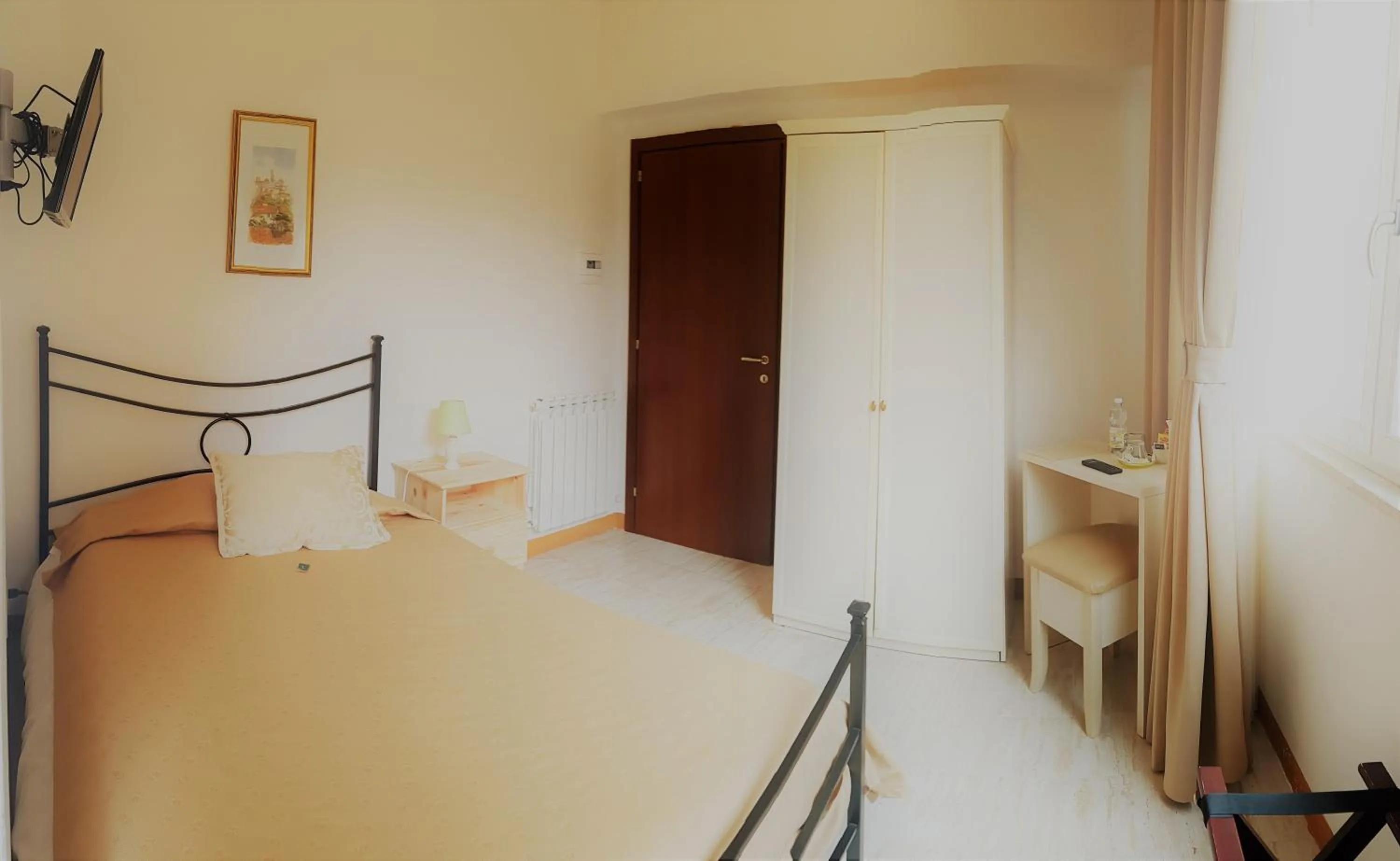 Bed in B&B I Tetti di Siena