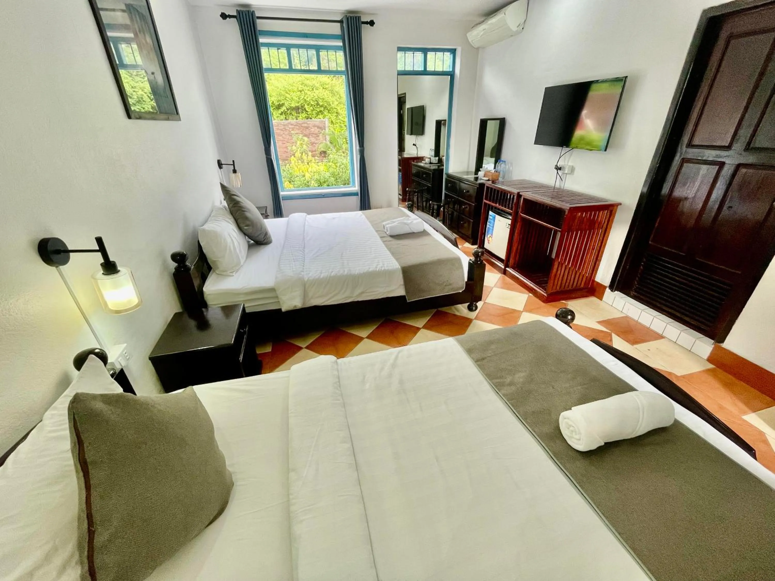 Bed in Villa Merry Lao Ban Aphay