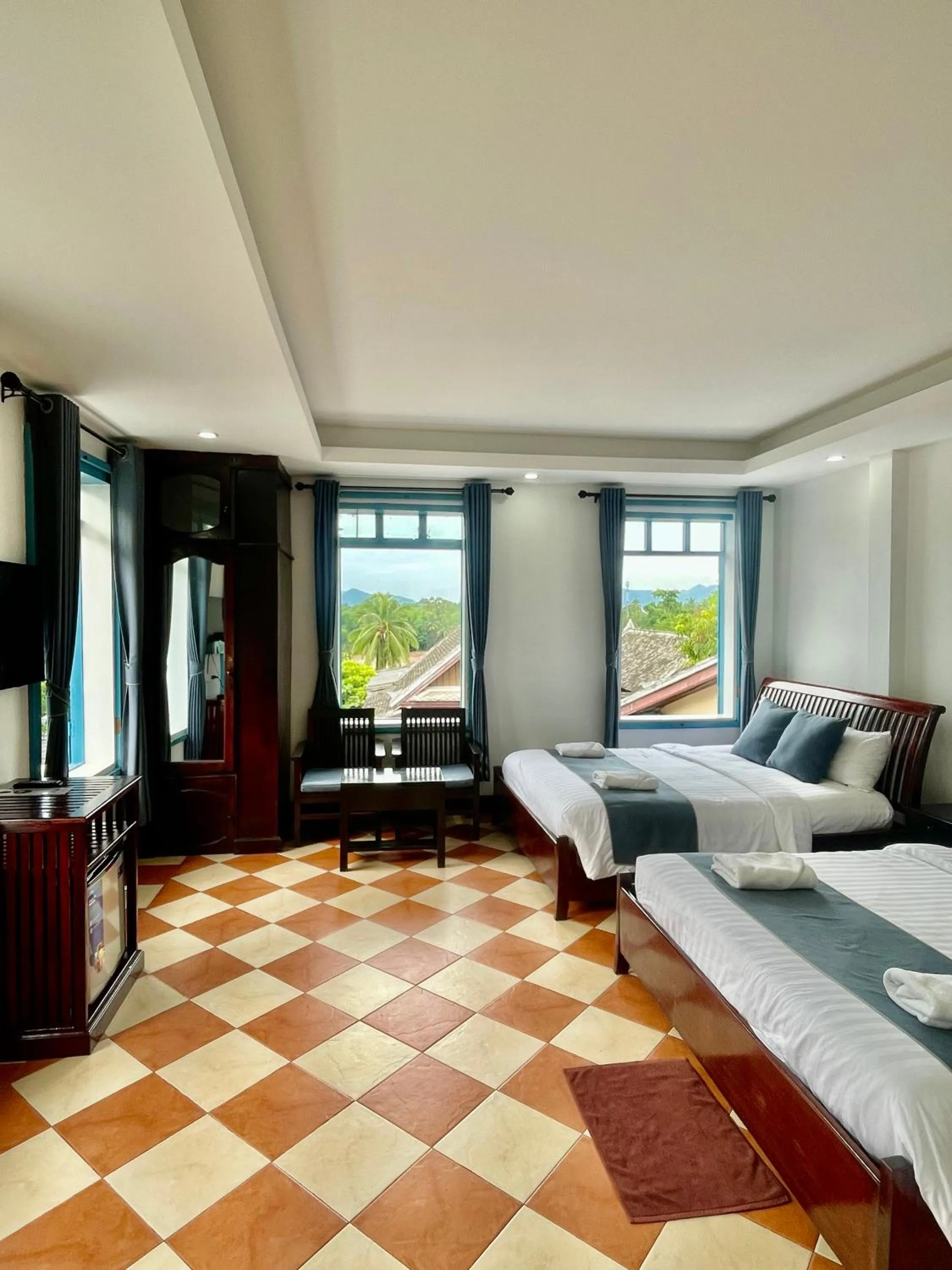 Photo of the whole room, Bed in Villa Merry Lao Ban Aphay