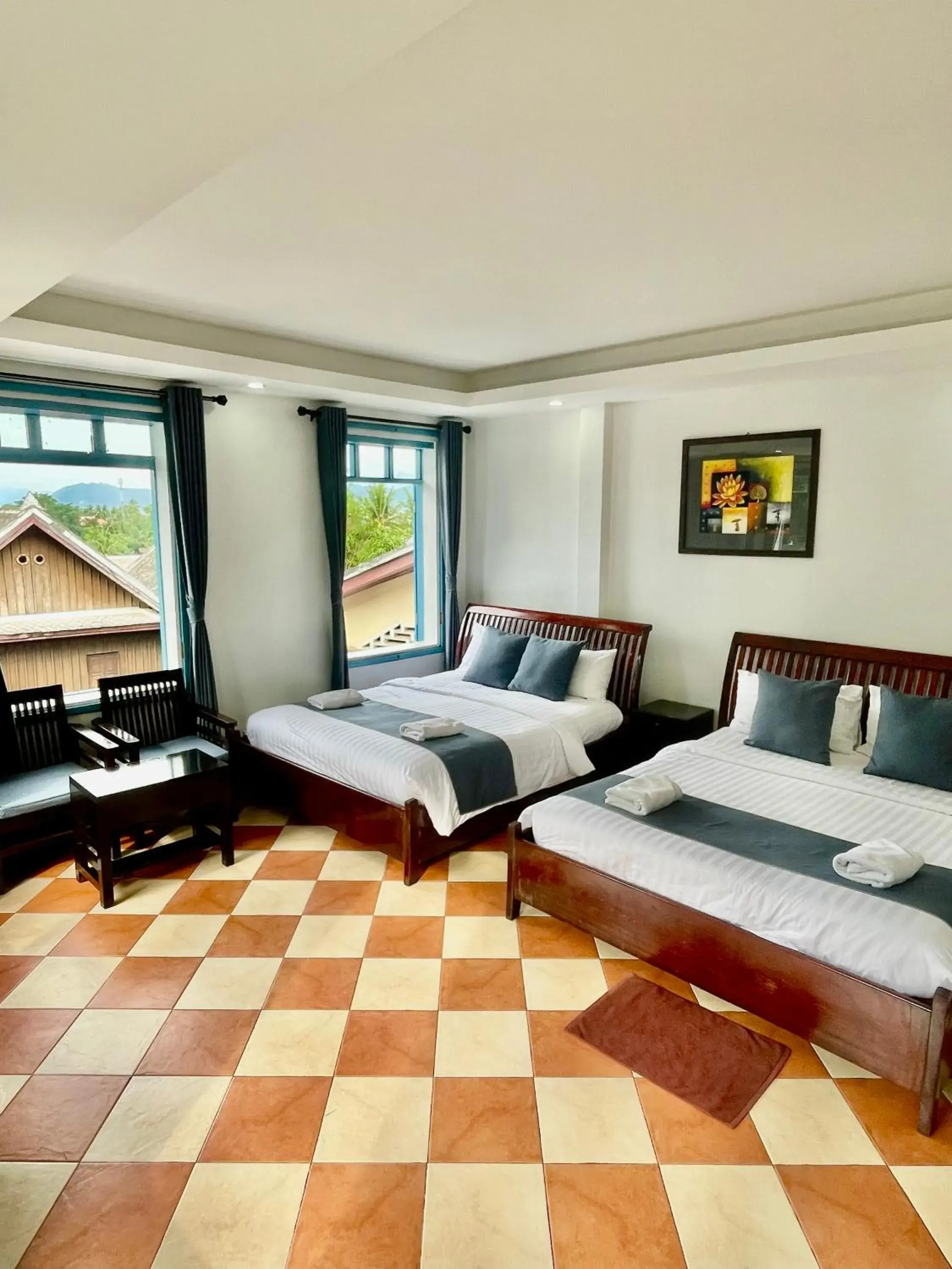Quadruple Room with Mountain View in Villa Merry Lao Ban Aphay Quadruple Room with Mountain View in Villa Merry Lao Ban Aphay
