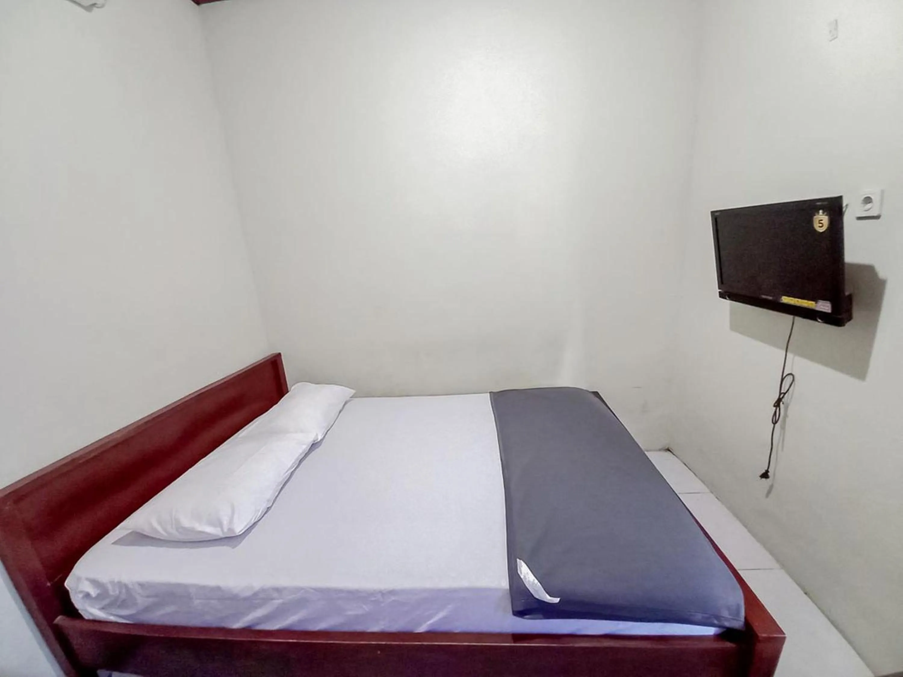 Bedroom, Bed in Hotel Gerung 2 near Luwes Mall Nganjuk Mitra RedDoorz