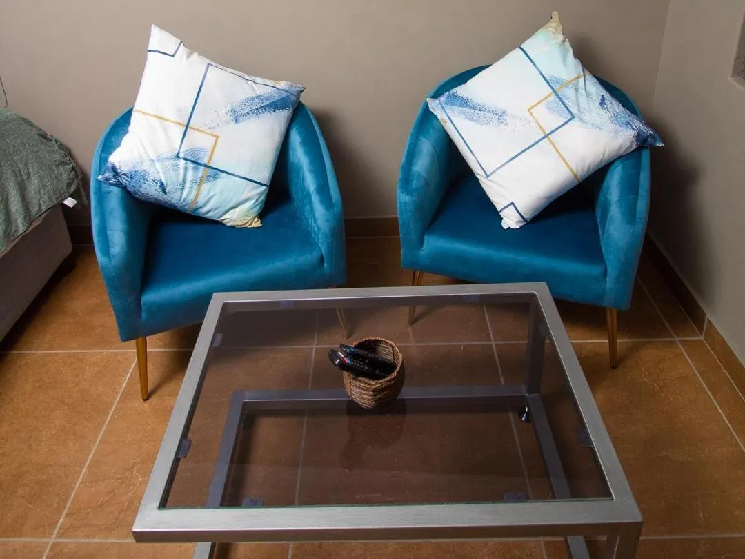 Seating area in @ 21 Guest House