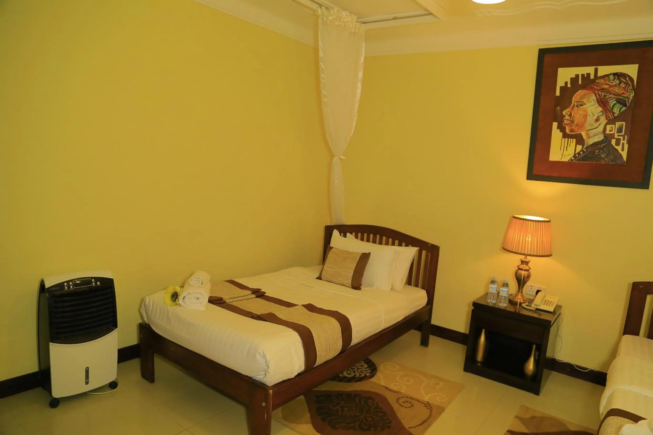 fireplace, Bed in Royal Victoria House Ltd