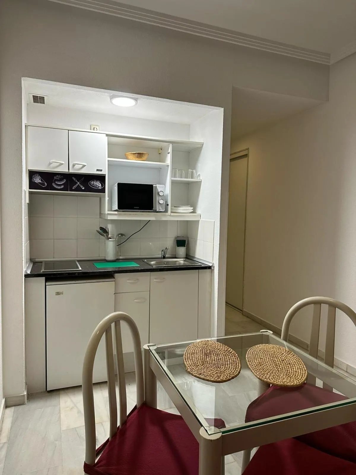 Kitchen or kitchenette in Hospedium Hotel Apartamentos Simón Verde